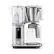 The image features a Breville BREW COLD WIRE CUSTOM T coffee maker and a coffee carafe. The coffee maker has a silver finish and is accompanied by a glass carafe. The carafe is placed on the counter next to the coffee maker, ready for use. The combination of the coffee maker and carafe creates a convenient and efficient coffee-making setup.