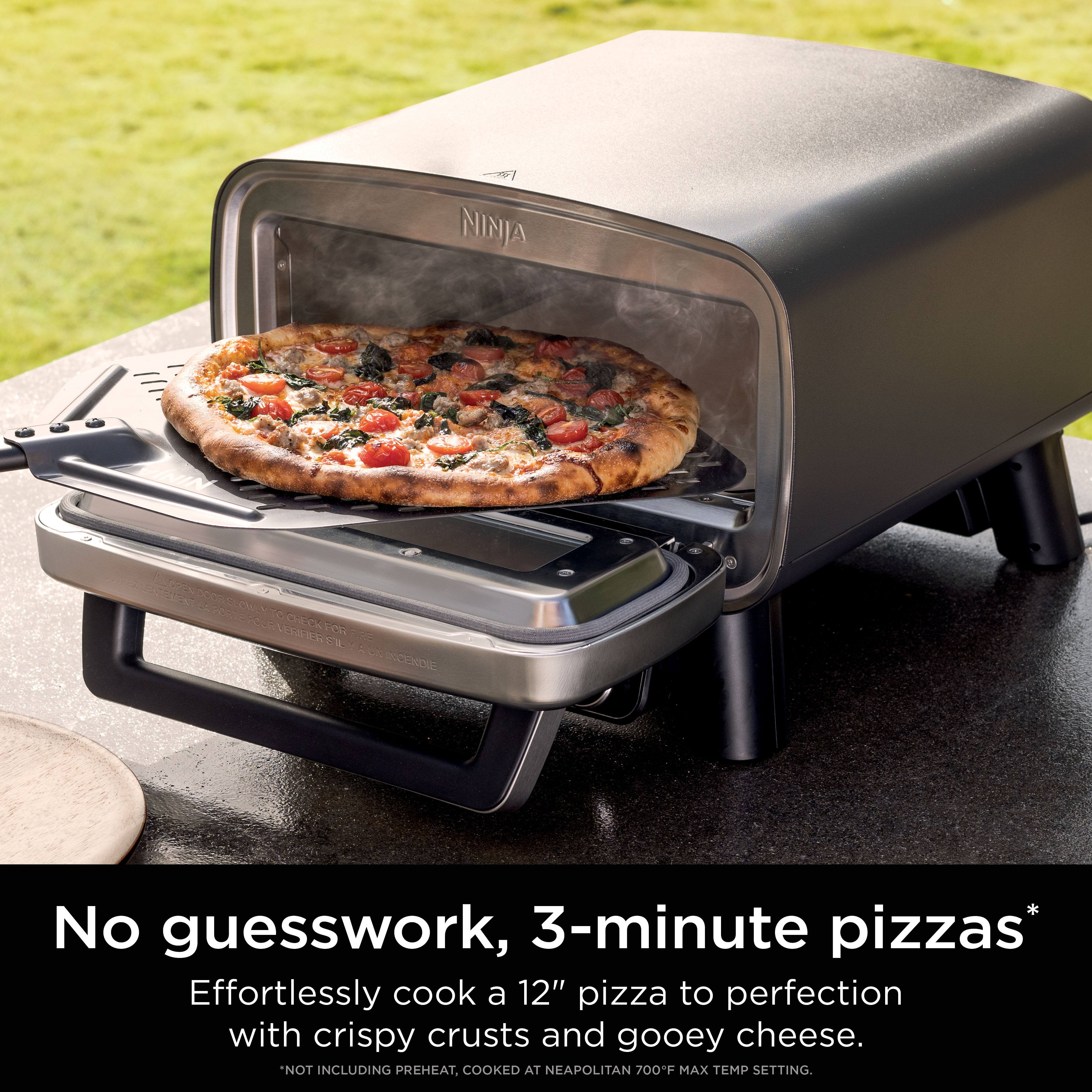 The text on the image reads: "No guesswork, 3-minute pizzas* Effortlessly cook a 12" pizza to perfection with crispy crusts and gooey cheese. NOT INCLUDING PREHEAT. COOKED AT NEAPOLITAN 700-F MAX TEMP SETTING."