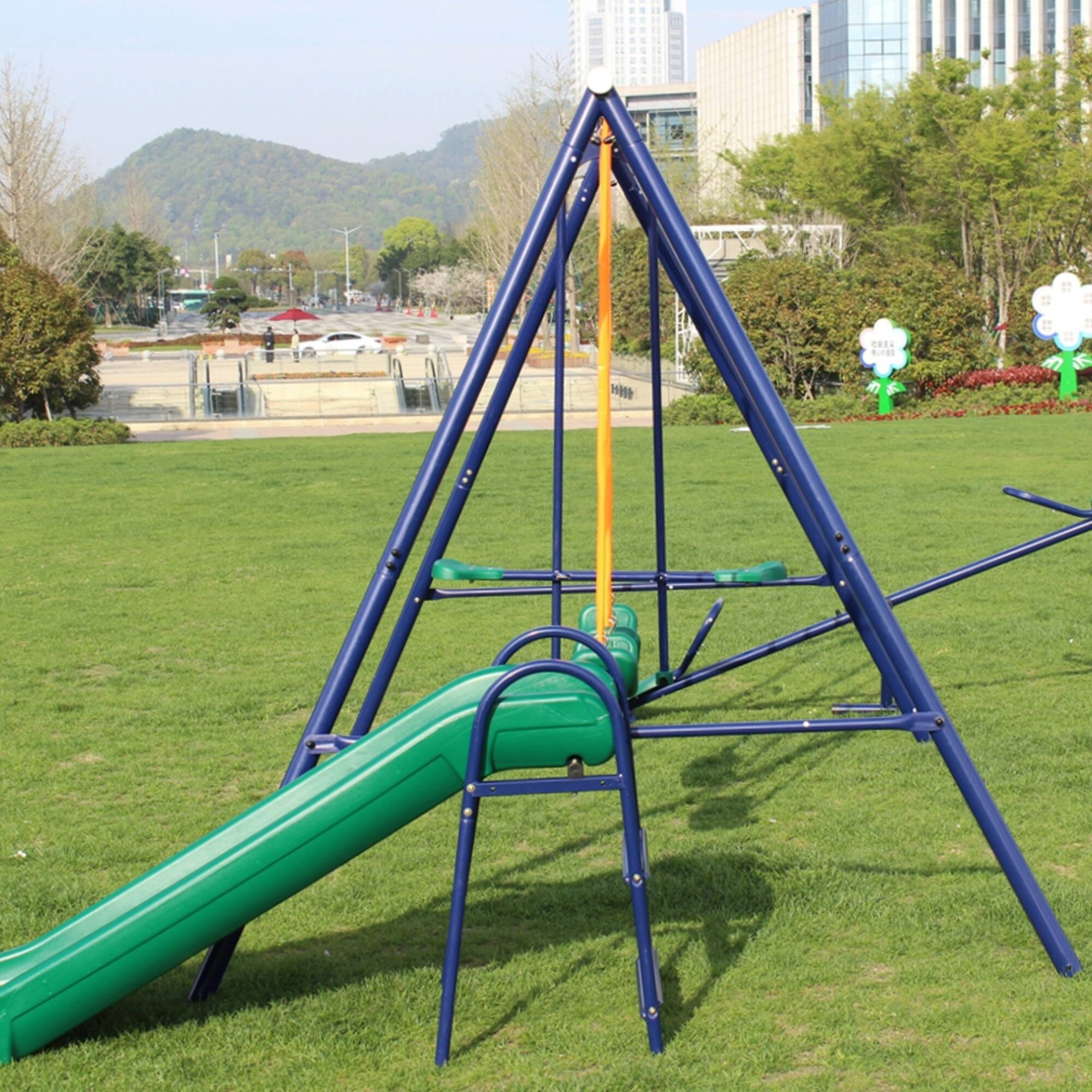 Left. ELEMENT ACE - Heavy-Duty Steel Swing Set with Slide for Outdoor Playground Fun and Recreation.