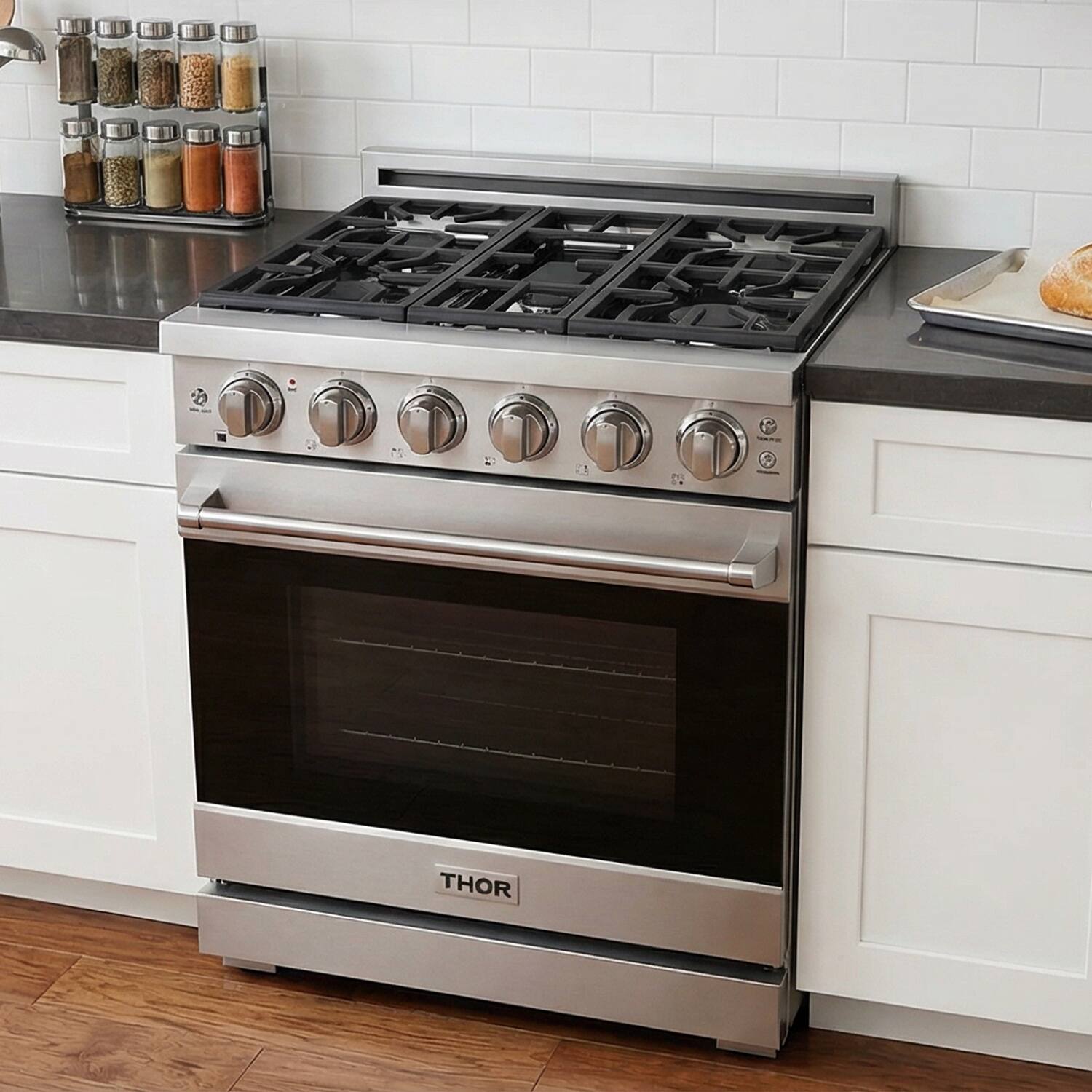 Angle. Thor Kitchen - Gordon Ramsay Series by Thor Kitchen 4.55 Cu. Ft Freestanding Gas Range with Rose Gold Hardware - Stainless Steel.