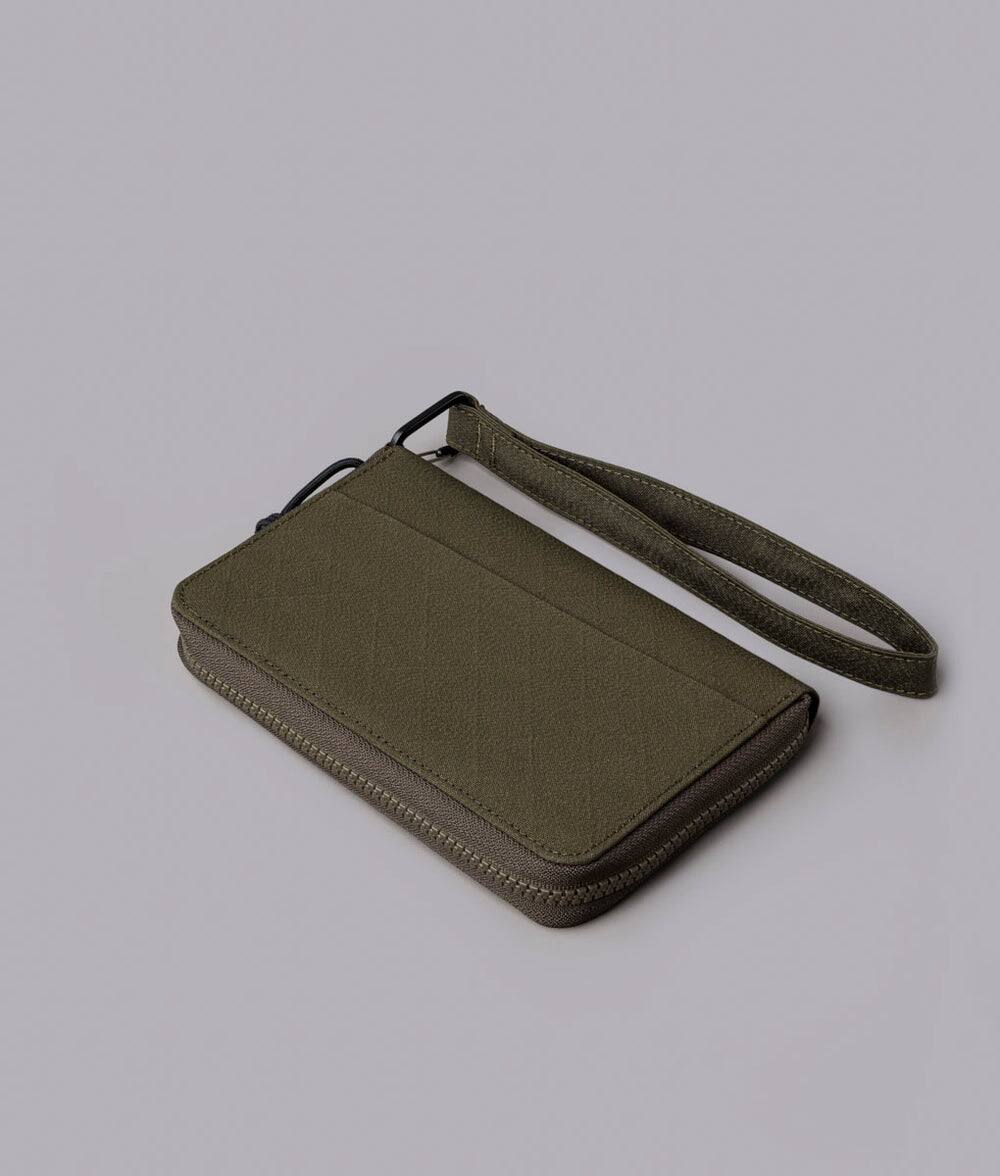 Angle. ALPAKA - RFID Zip Passport Wallet with Boarding Pass Pocket, 7 Card Slots, Magnetic Flaps, Detachable Hand Strap - Army Green Axogrid 300D.