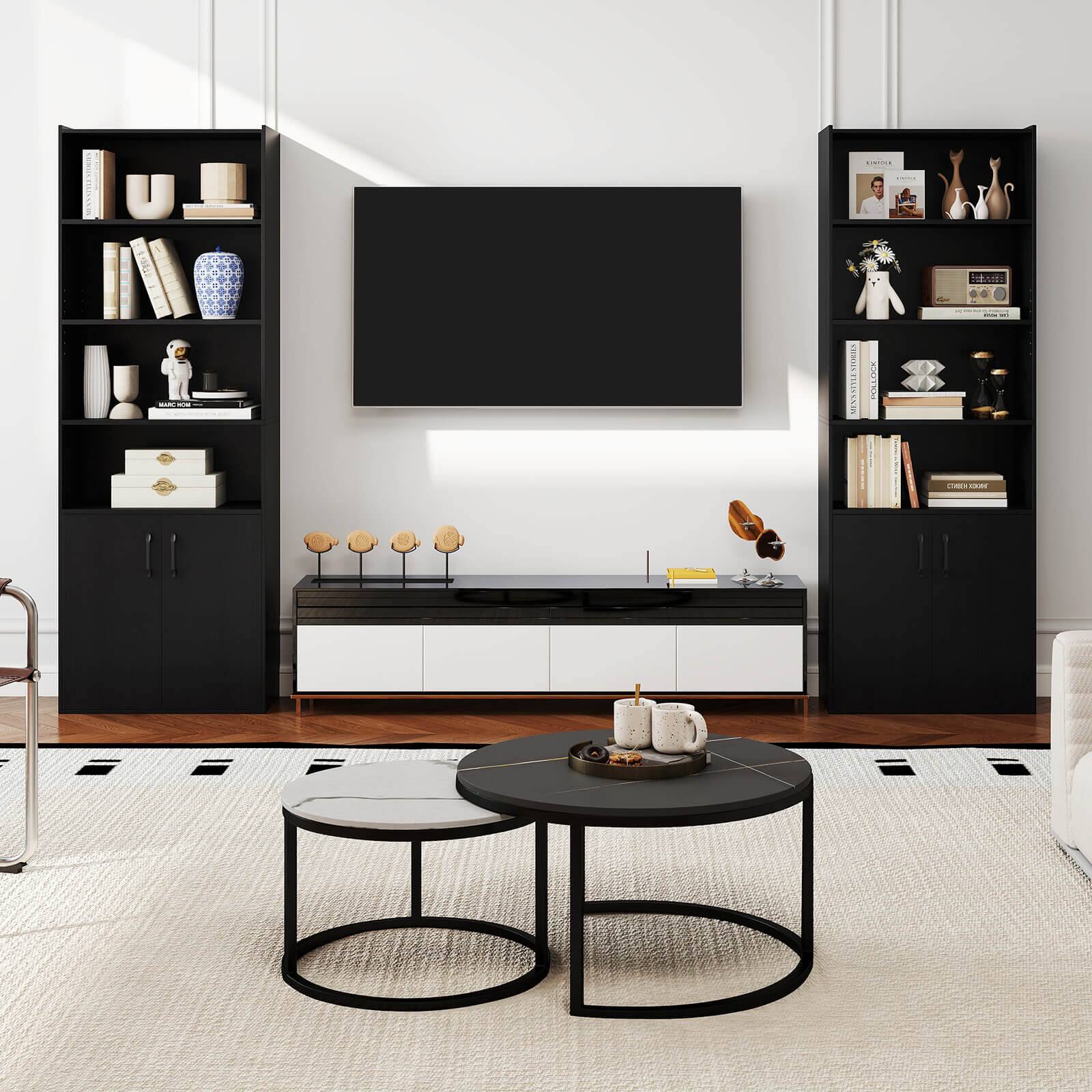 The living room is clean and well-organized. There is a black bookshelf on the left side of the room, filled with books and decorative items. A black table is placed in the center of the room, and a black coffee table is situated in front of a couch. A television is mounted on the wall, and a vase is displayed on a surface. The room also features a rug, adding to the cozy atmosphere.