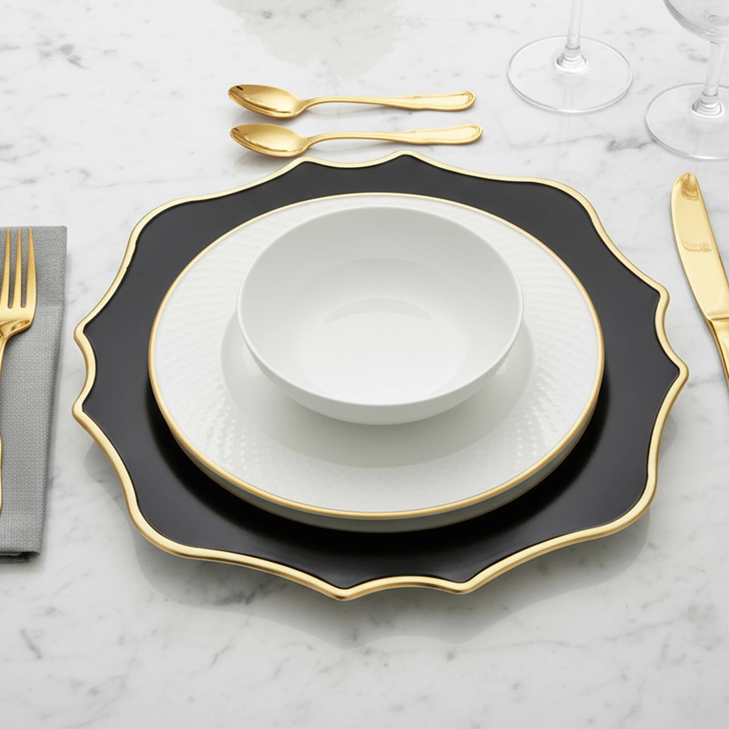 Left. American Atelier - Scallop Black & Gold with White Center Set of 4 Charger Plates 13"D - Black.