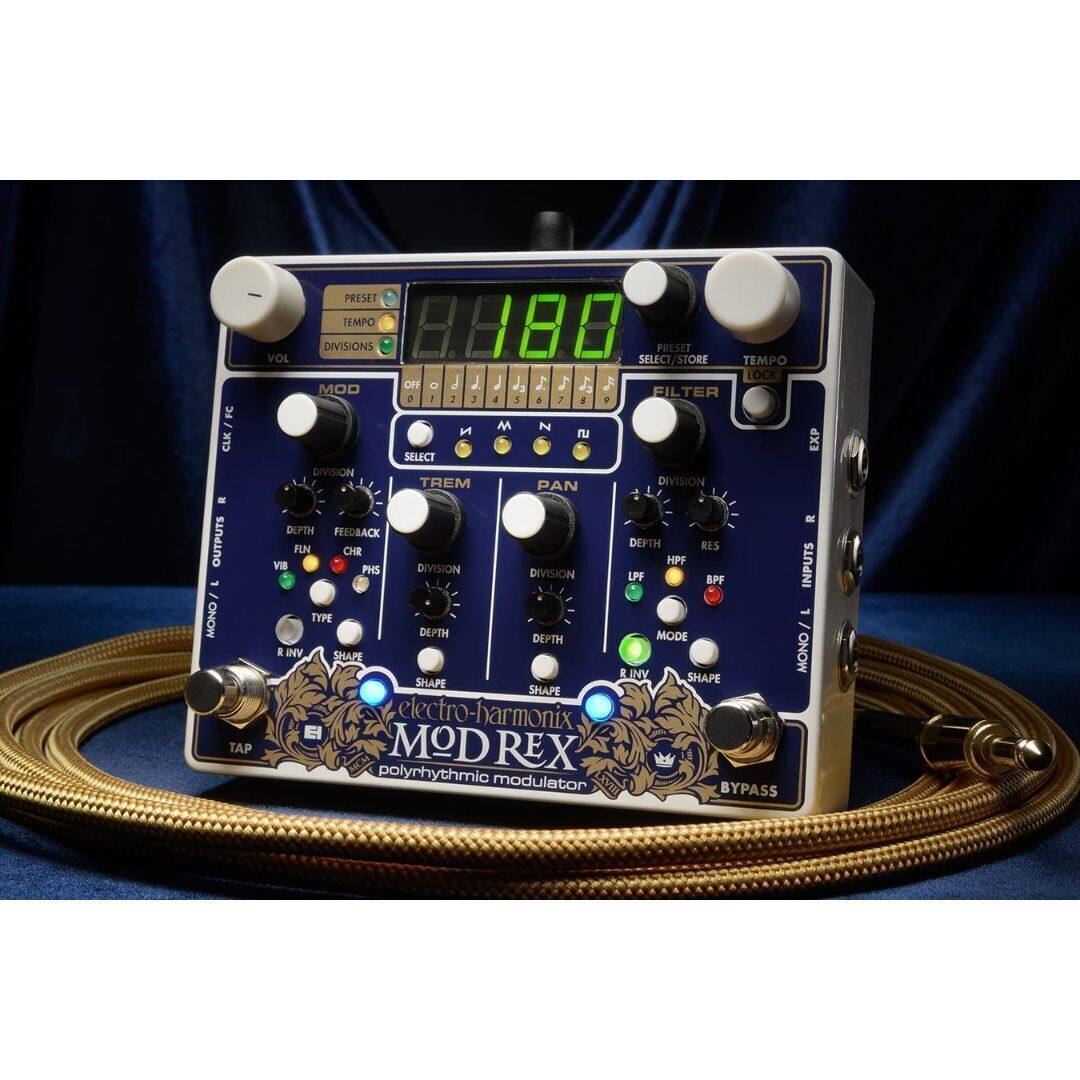 IFC CLK - OUTPUTS - MONO TAP PRESET TEMPO 180 DIVISIONS PRESET VOL SELECT/STORE TEMPO LOCK MOD on O d J J J. 1 1 1  FILTER a - : 3 . 1 A 7 8 V M N  un EXP SELECT DIVISION TREM PAN DIVISION D DEPTH FEEDBACK DEPTH RES FEN H vI HPF PHS DIVISION DIVISION LPF BPF INPUTS - TYPE DEPTH MODE DEPTH E INV SNAPE MONO E INV SHAPE SHAPE SHAPE electro-harmonix MOD REX polyrhythmic modulator BYPASS