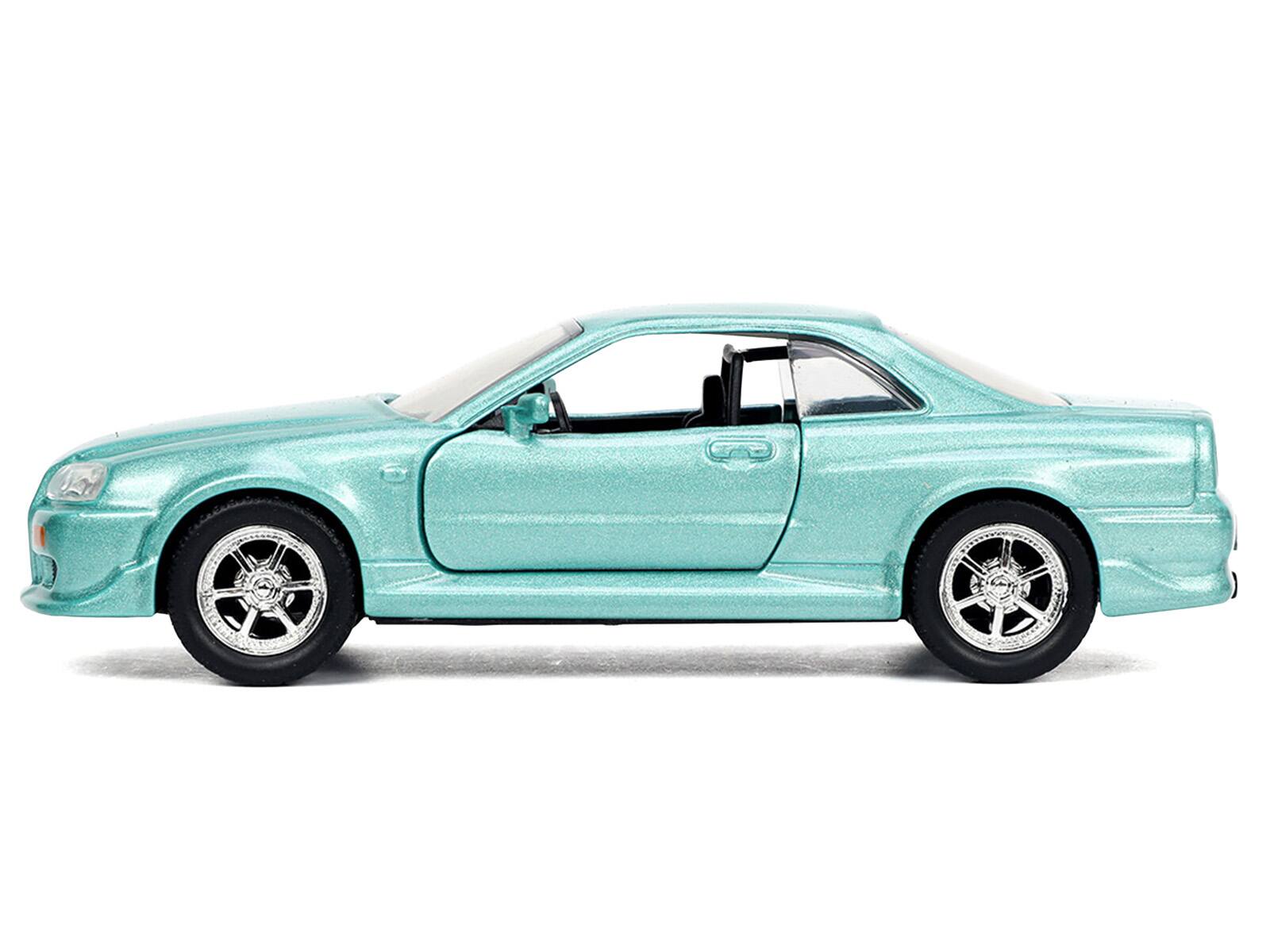 Alt View 2. Jada - Brian's Nissan Skyline GT-R (BNR34) RHD Turquoise Metallic "Fast & Furious" Movie 1/32 Diecast Model Car by Jada - Multicolor.