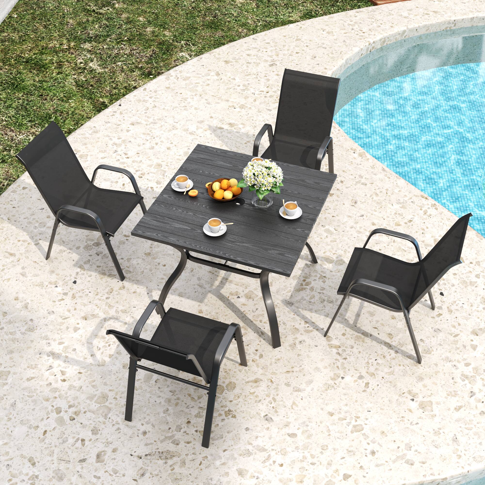 Left. Mondawe - 4-Piece Outdoor Dining Chairs Set, Teslin Fabric and Metal Frame - Black.