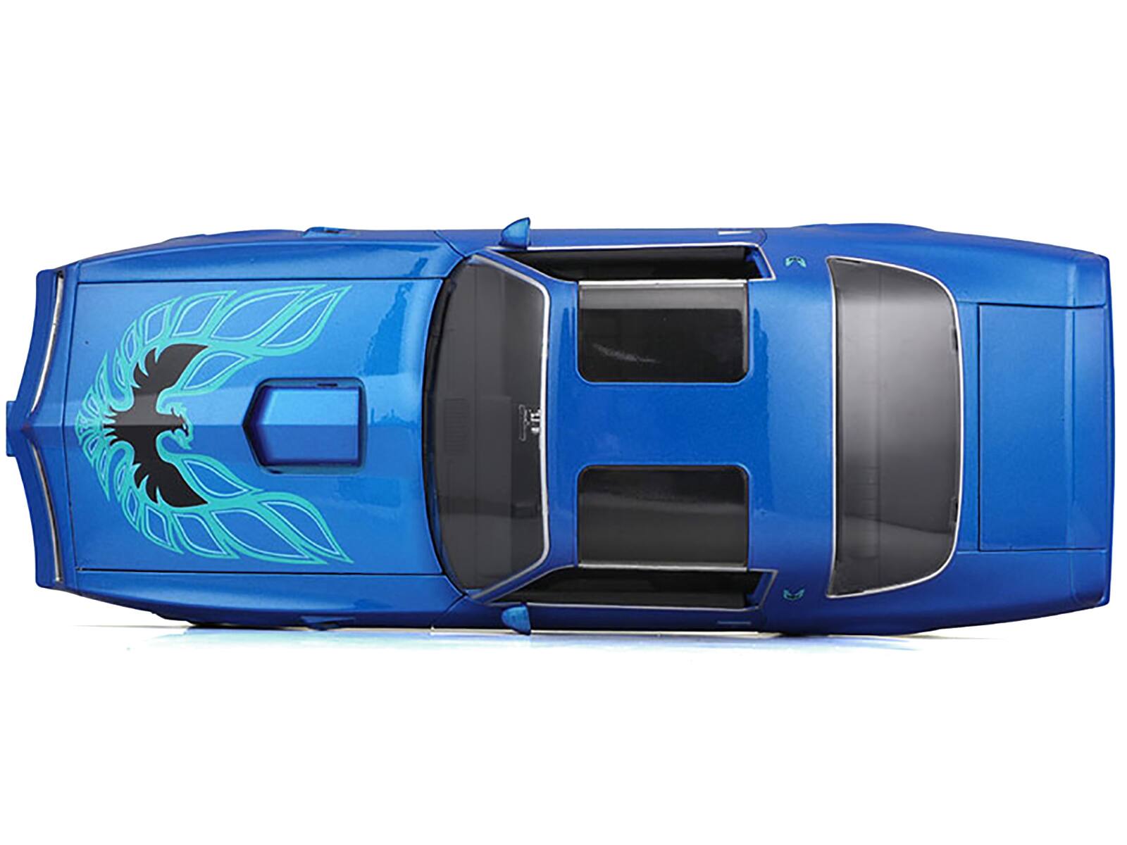 Left. Maisto - 1978 Pontiac Firebird Trans Am Blue Metallic with Hood Graphics "Special Edition" Series 1/18 - Blue Metallic.