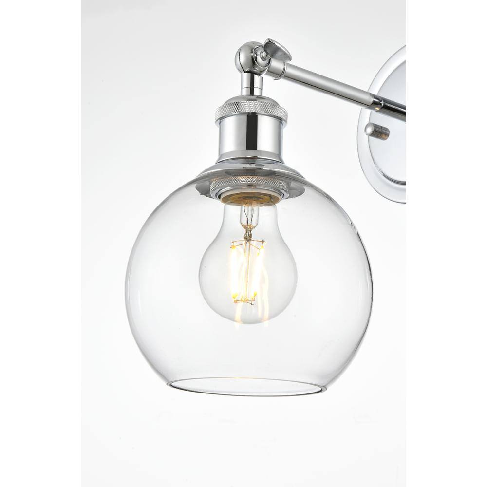 Left. Living District - Kai 1 light Chrome and Clear Bath Sconce - Chrome And Clear.