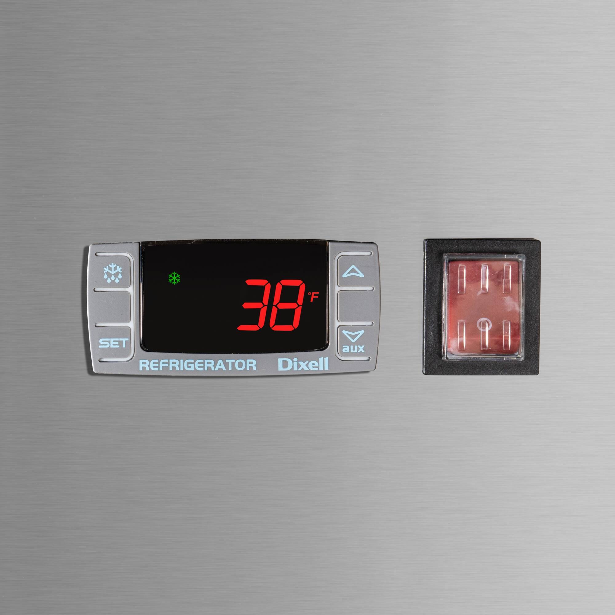 The text on the image reads: "F 38 SET aux REFRIGERATOR Dixell BAA A9." This text is grouped as follows:

1. F 38 SET: This is a temperature setting for the refrigerator, indicating that the temperature should be set to 38 degrees Fahrenheit.
2. aux: This stands for auxiliary, which might refer to an additional feature or function of the refrigerator.
3. REFRIGERATOR: This is the main function of the device, which is to store and preserve food items at a low temperature.
4. Dixell BAA A9: This is likely the brand and model of the refrigerator, with "Dixell" being the brand name and "BAA A9" being the model number.
