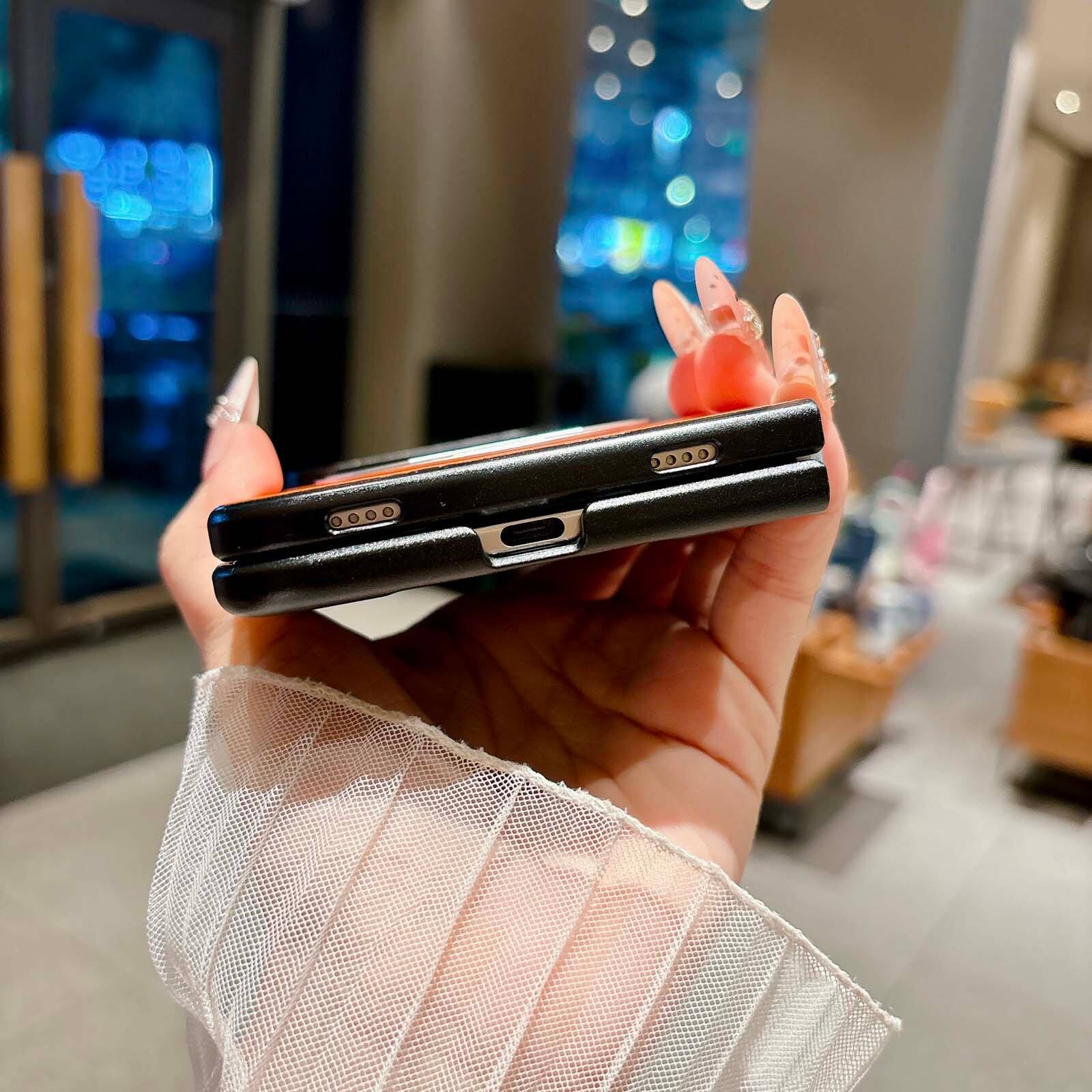 Alt View 3. Dteck - for Apple iPhone Duo Magnetic Lychee Texture Case,Shock-absorbent Rugged Protective Cover with 360 Rotating Kickstand - Orange.