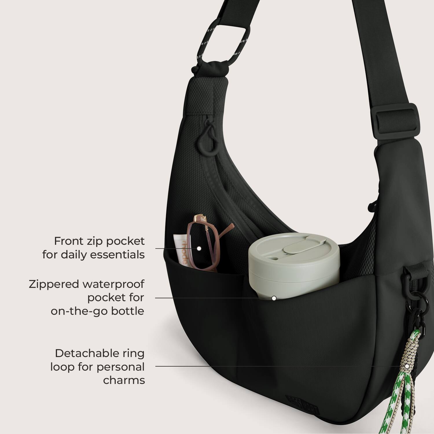 Front zip pocket for daily essentials  
Zippered waterproof pocket for on-the-go bottle  
Detachable ring loop for personal charms