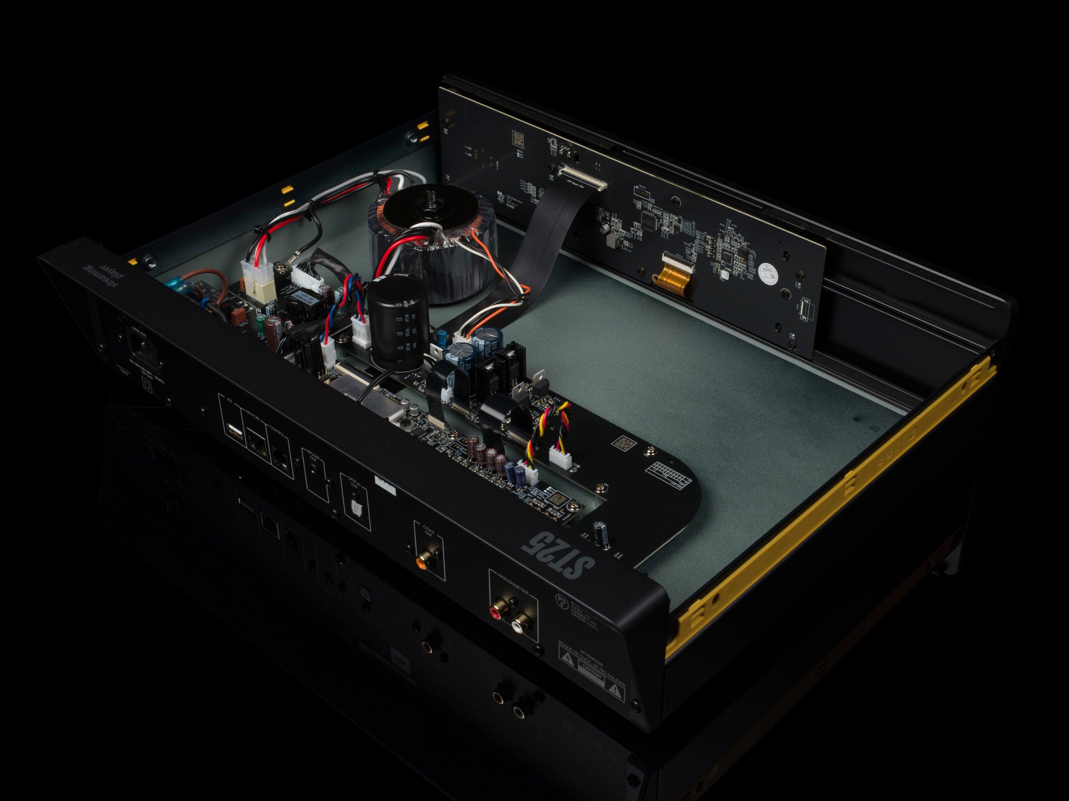 The text on the image reads "Syueags Jaied - - - ST25 - mo -". However, it is unclear what this text represents or its significance. It could be a code, a name, or a description related to the electronic device.