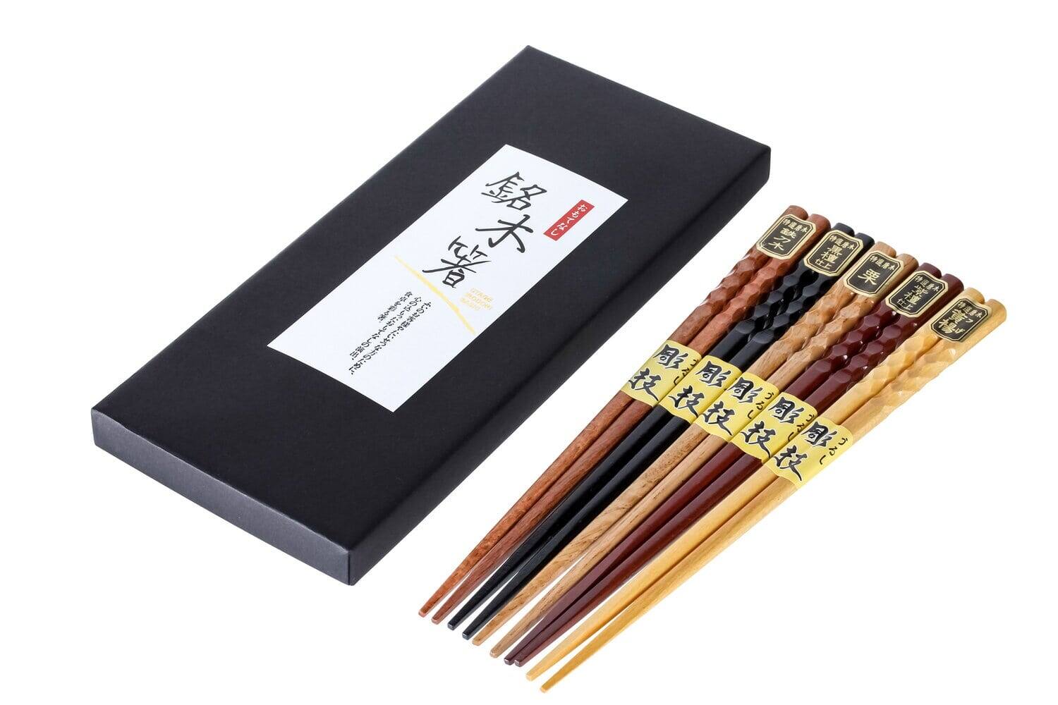 The text on the image is "銘木箸" which translates to "branded wooden chopsticks".