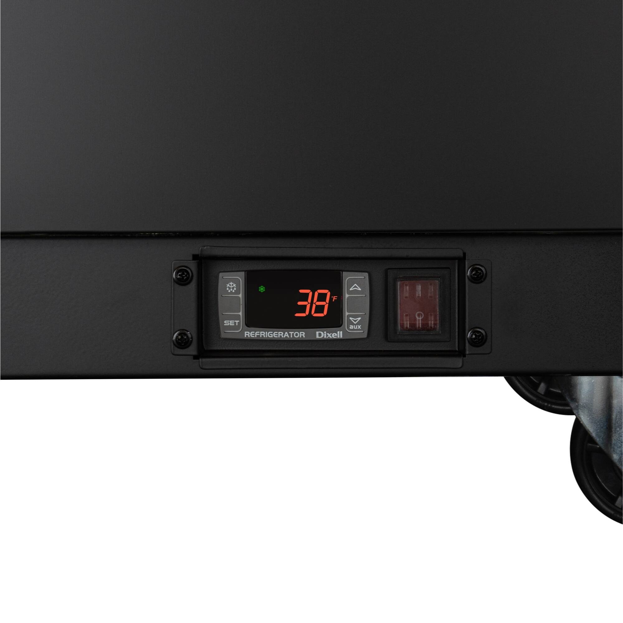 The text on the image reads "38 SET aux REFRIGERATOR Dixell!" which is a combination of different elements. The first part, "38 SET," could be a reference to the temperature setting inside the refrigerator. The second part, "aux REFRIGERATOR," might indicate that the refrigerator is an auxiliary unit, possibly for a larger appliance. The last part, "Dixell!", could be a brand name or a logo associated with the refrigerator.