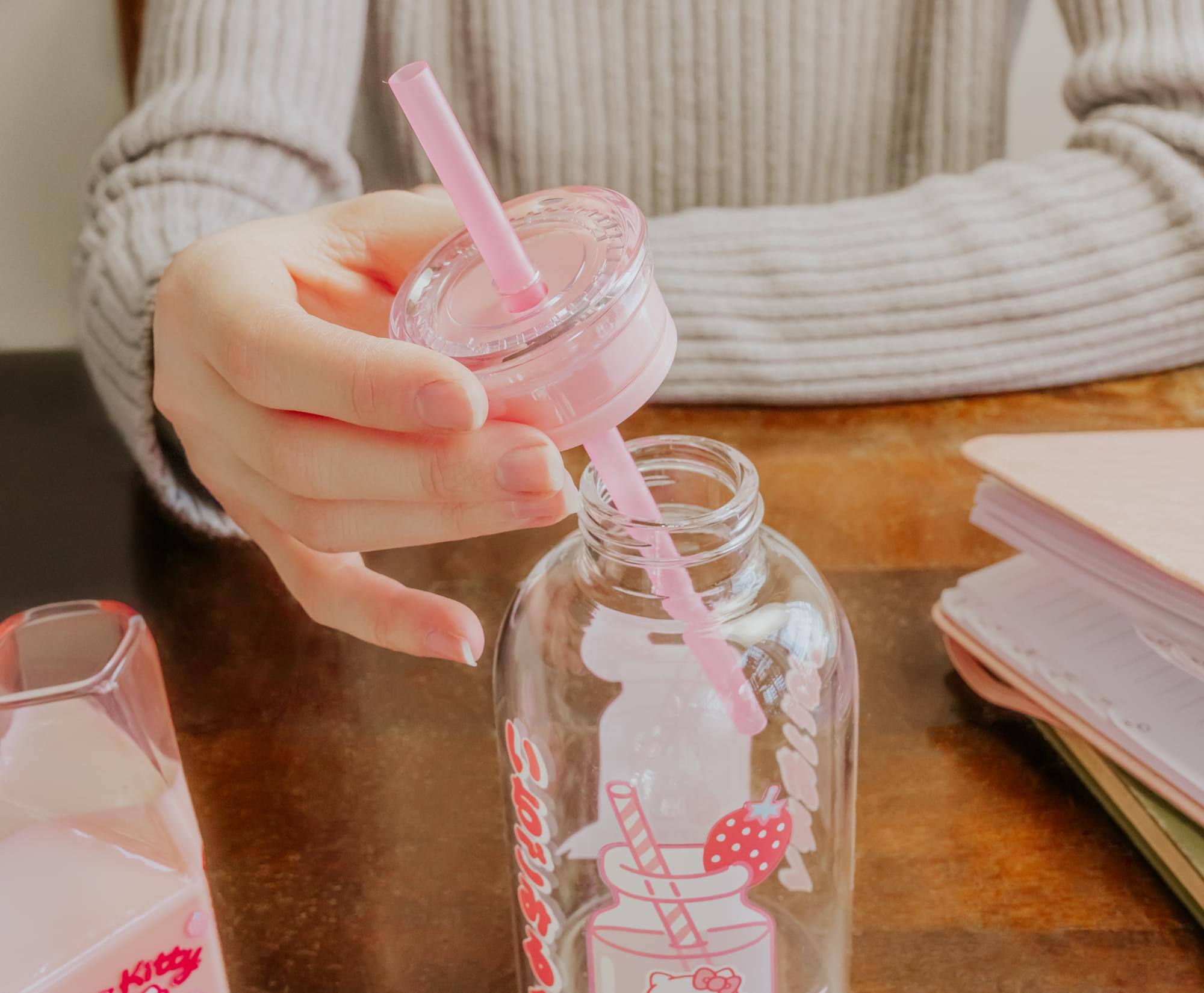 Alt View 3. Silver Buffalo - Sanrio Hello Kitty Strawberry Glass Milk Bottle With Straw | Holds 15 Ounces - Pink.