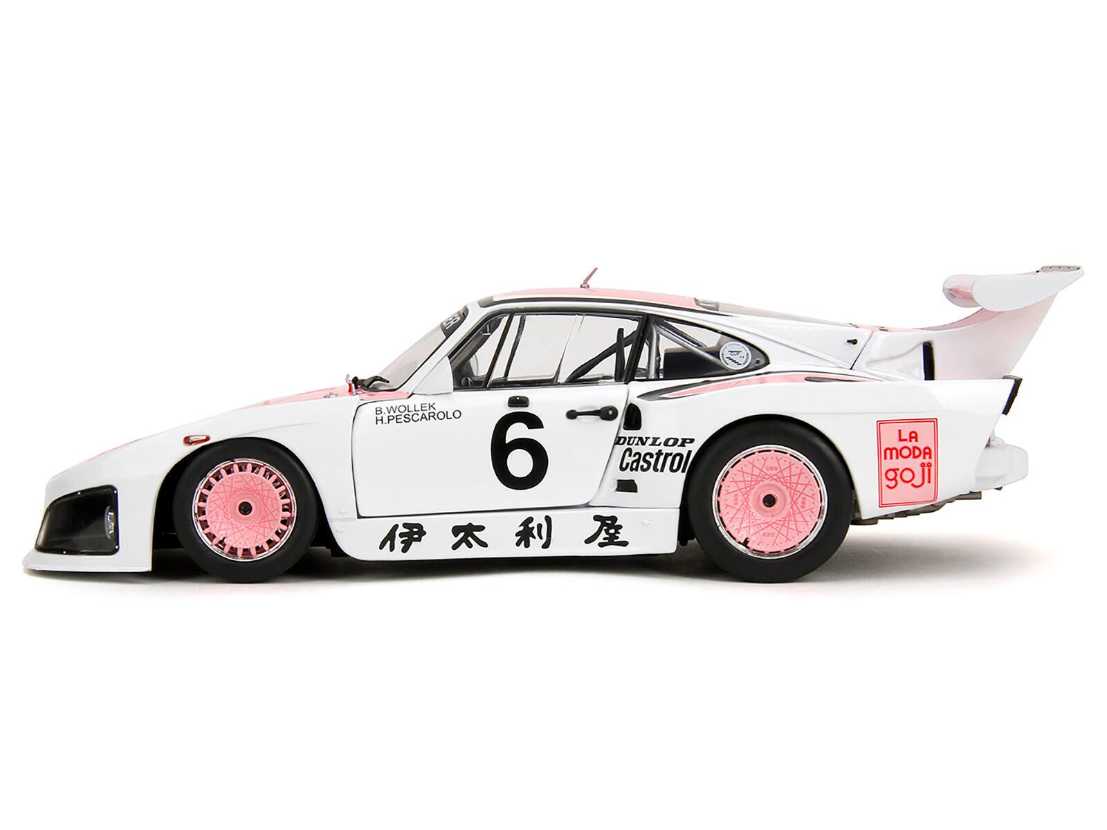 B. WOLLEK  
H. PESCAROLO  
DUNLOP  
6  
Castrol  
LA MODA goji