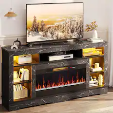 "A flat screen TV is sitting on a black entertainment center with a fireplace underneath. The TV is turned on and displaying a snowy scene. The entertainment center also has a bookshelf with several books on it. There is a vase on the right side of the TV and a potted plant on the left side. The room also has a fireplace, adding warmth and ambiance to the space."