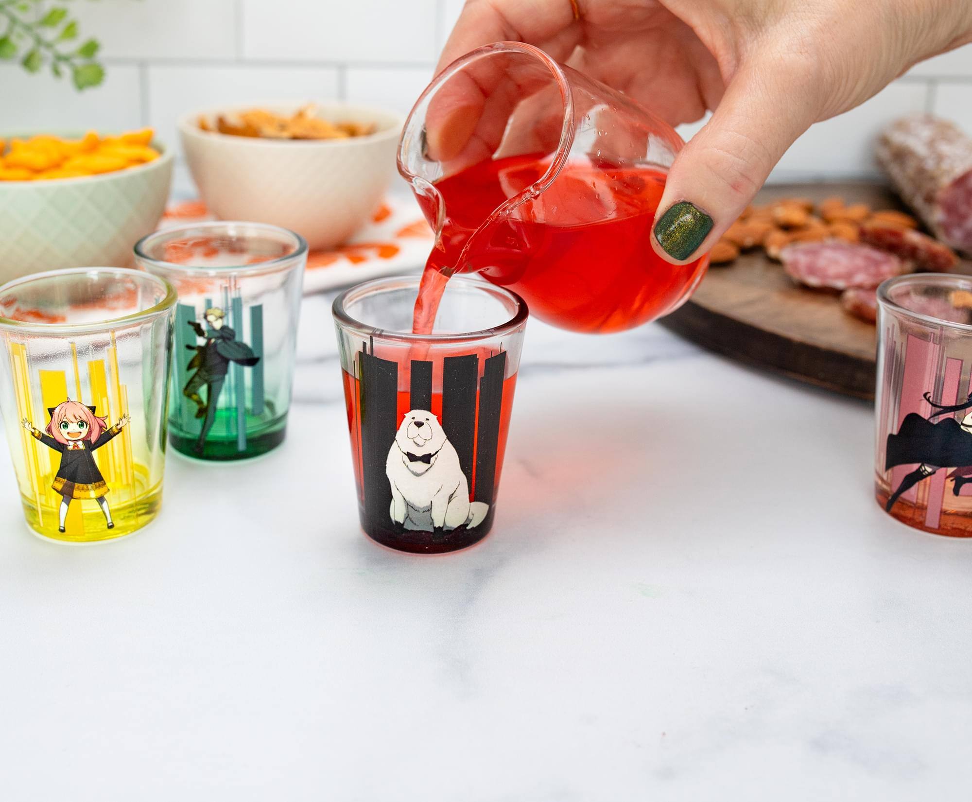 Alt View 4. Silver Buffalo - Spy x Family Trio and Logo 2-Ounce Mini Shot Glasses | Set of 4 - Pink.