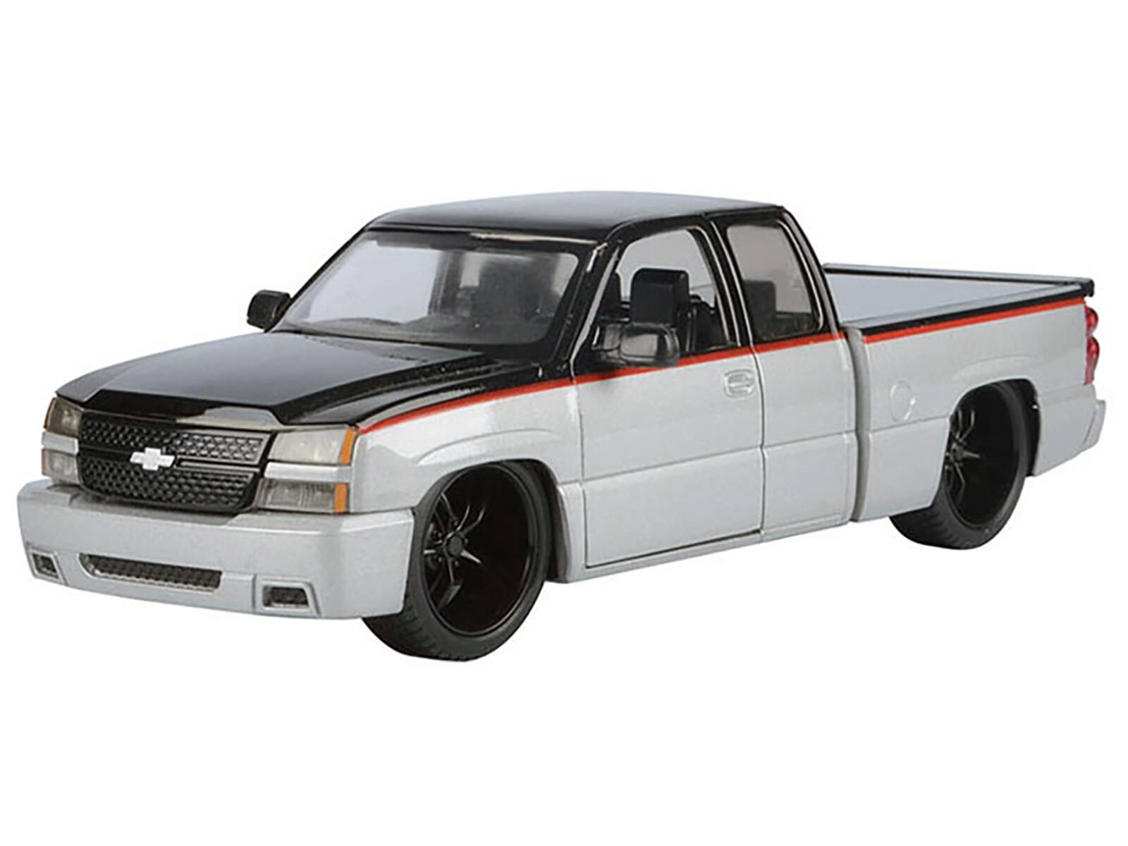 Angle. Motormax - 2006 Chevrolet Silverado Custom Pickup Silver Metallic Black Red Stripes Die-Cast Collection Series 1/25 - Silver, Black, Red.