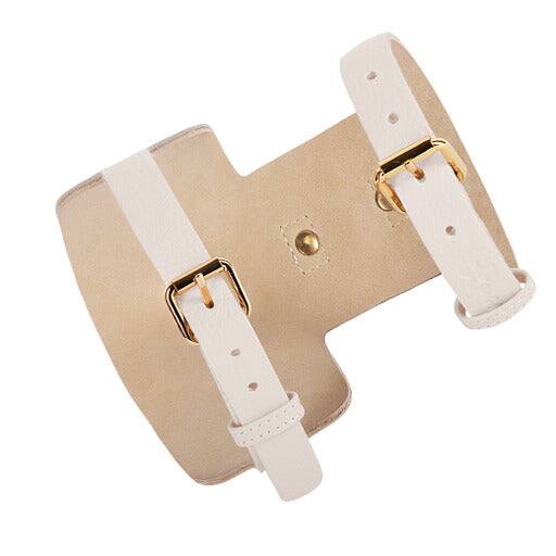 Angle. PoisePup - Luxe Adjustable Leather Harness Vest, Soft with Bow and Crystal for Dogs - Cream.