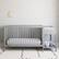 Angle. Graco - Fable 4-in-1 Convertible Crib and Changer - Pebble Gray.