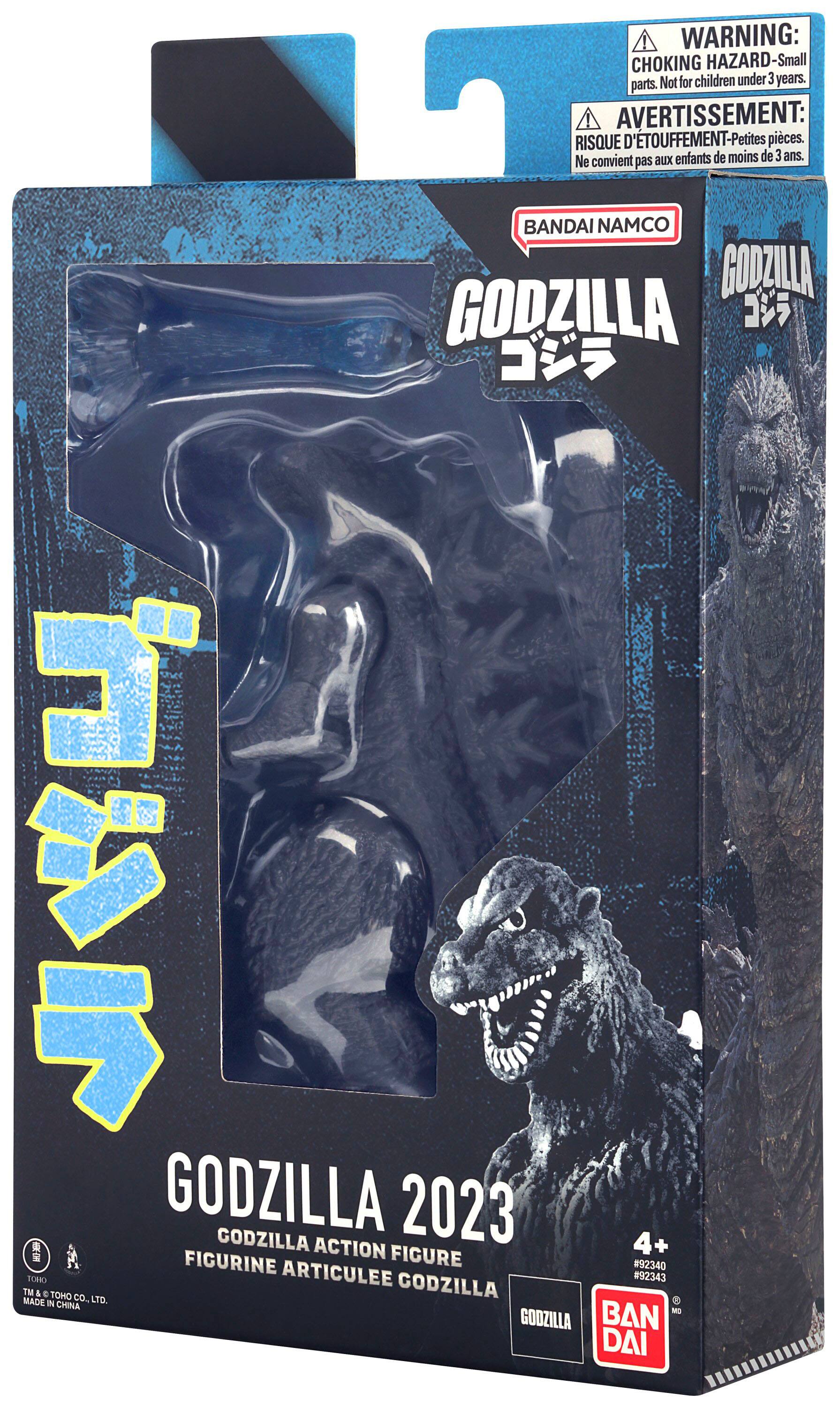 The text on the image reads:

"WARNING: CHOKING HAZARD-Small parts. Not for children under 3 years.
Avertissement: RISQUE D'TOUFFEMENT-Petites pices. Ne convient aux enfants de moins de 3 ans.

BANDAI NAMCO GODZILLA GODZILLA 2023 GODZILLA ACTION FIGURE #92340 TOMO ARTICULEE CODZILLA #92343 TM & E TO MADE CO., LTD. IN CHINA BANDAI"
