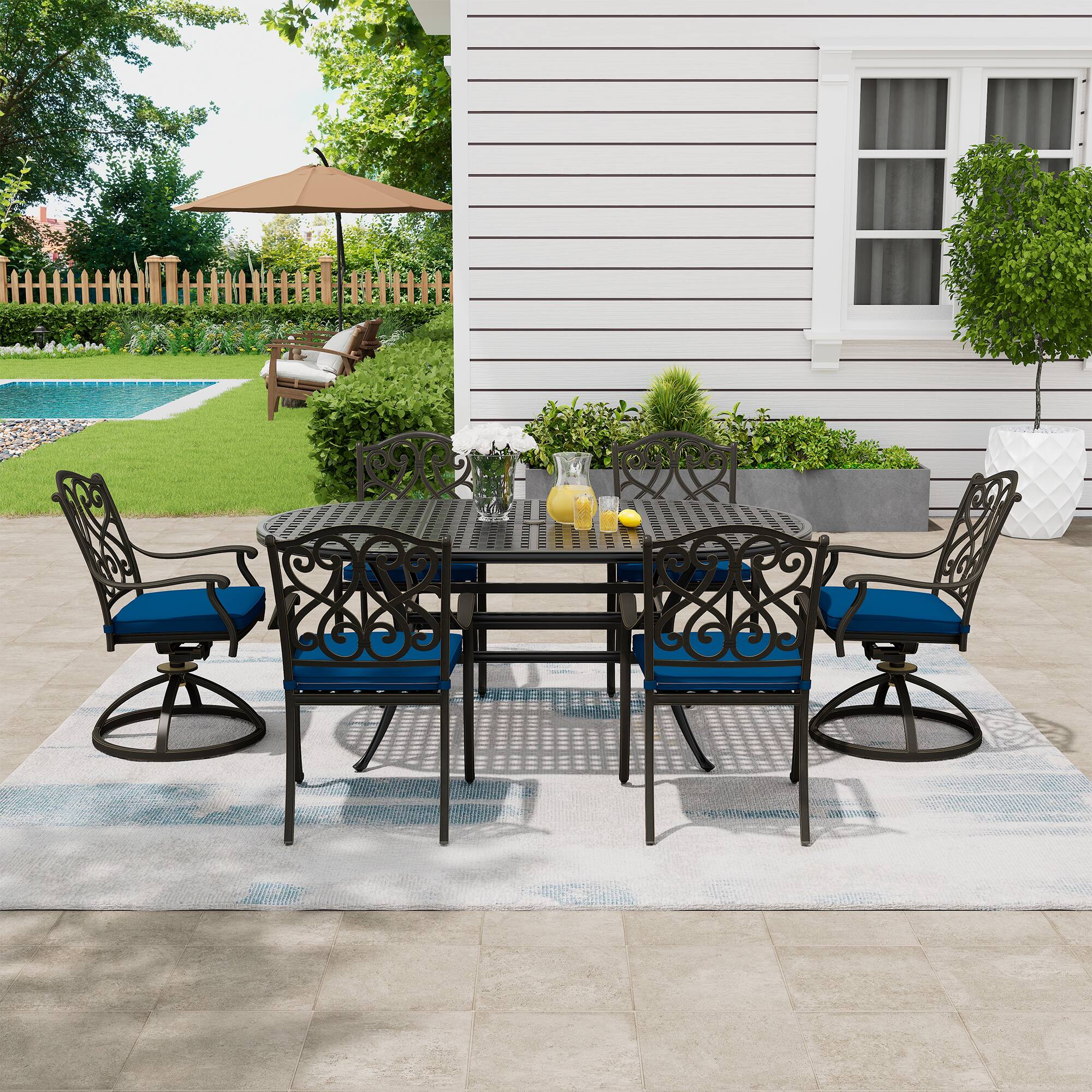 Left. Mondawe - 6 Person Elliptical Outdoor Dining Set with Cushions - Black+Blue.