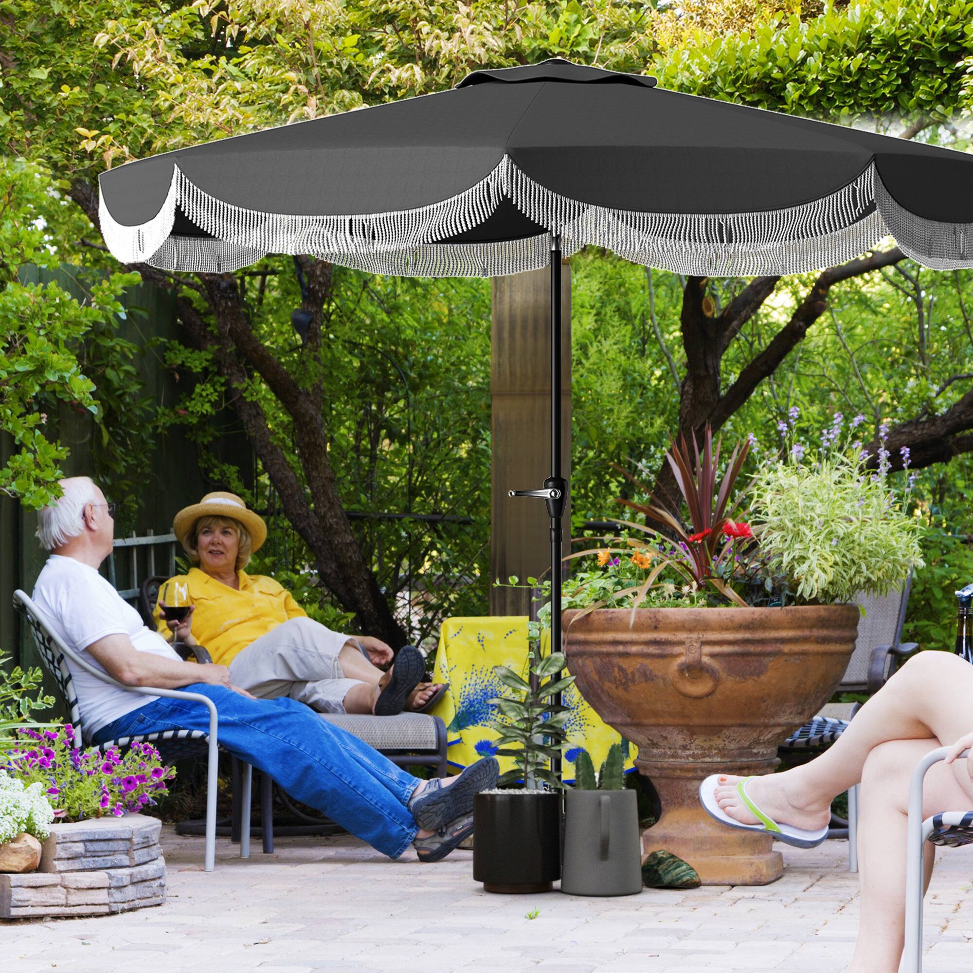 Angle. Outsunny - 9FT Patio Umbrella, UPF 30+ Outdoor Market Umbrella with Crank, 8 Ribs, Push Button Tilt, Vented Patio Table Umbrella - Charcoal Gray.