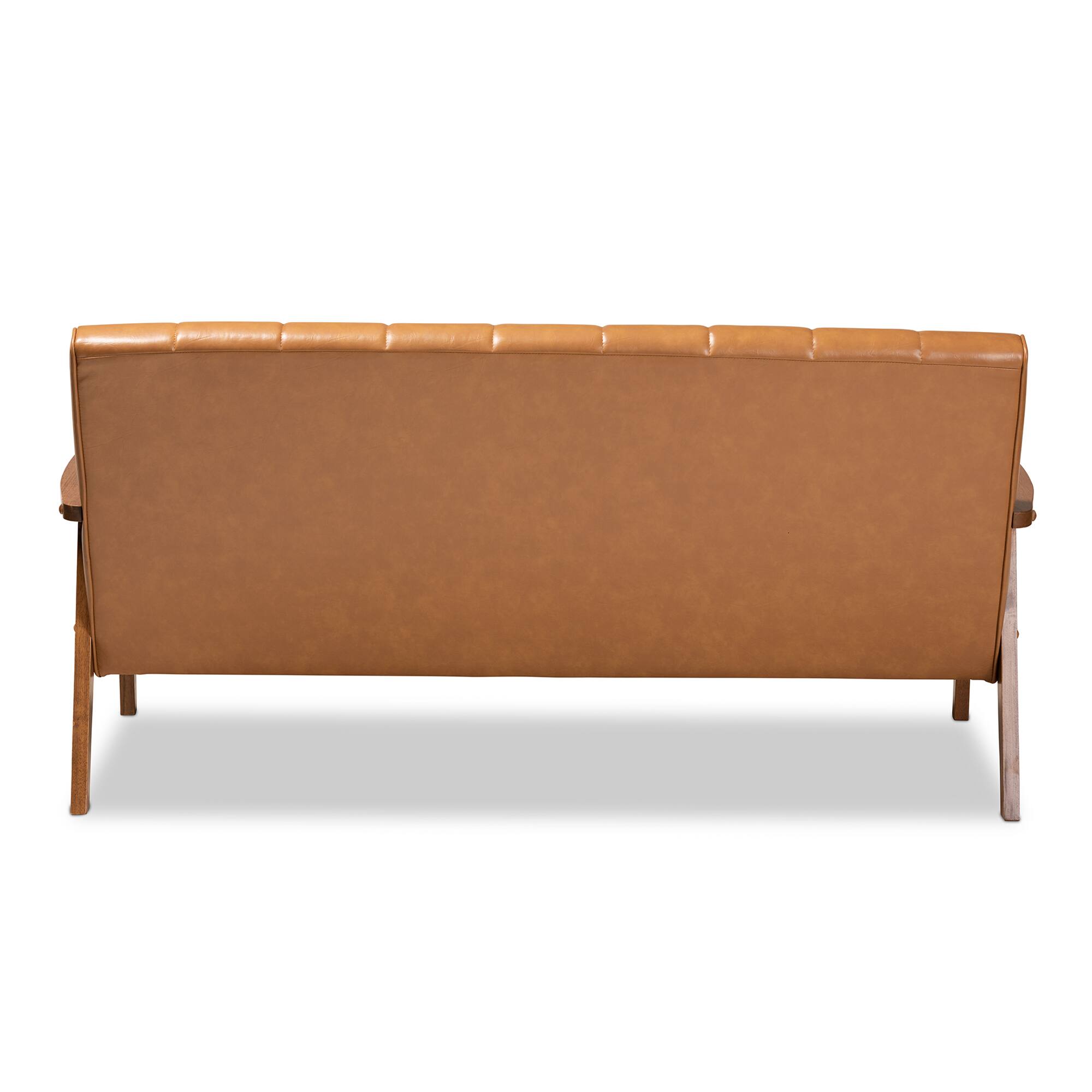 Back. Baxton Studio - Nikko Mid-century Modern Faux Leather Upholstered and Walnut finished Wood Sofa - Tan/walnut brown.
