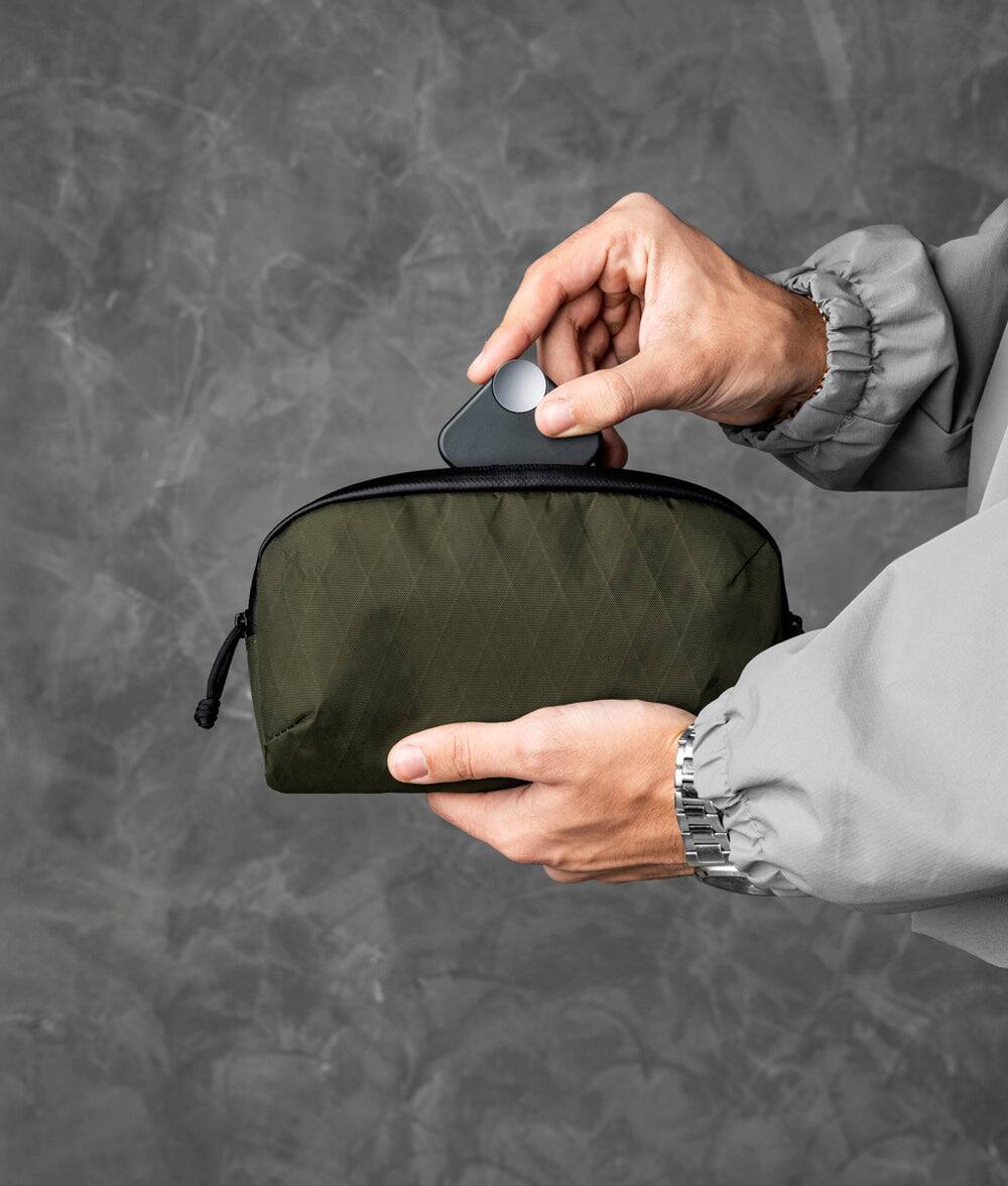 Angle. ALPAKA - 0.7L Men's Carry-All & Organizer Clutches;Crossbody Bag for Men with RFID Blocking, Passport Holder - Olive Green X-Pac X42.