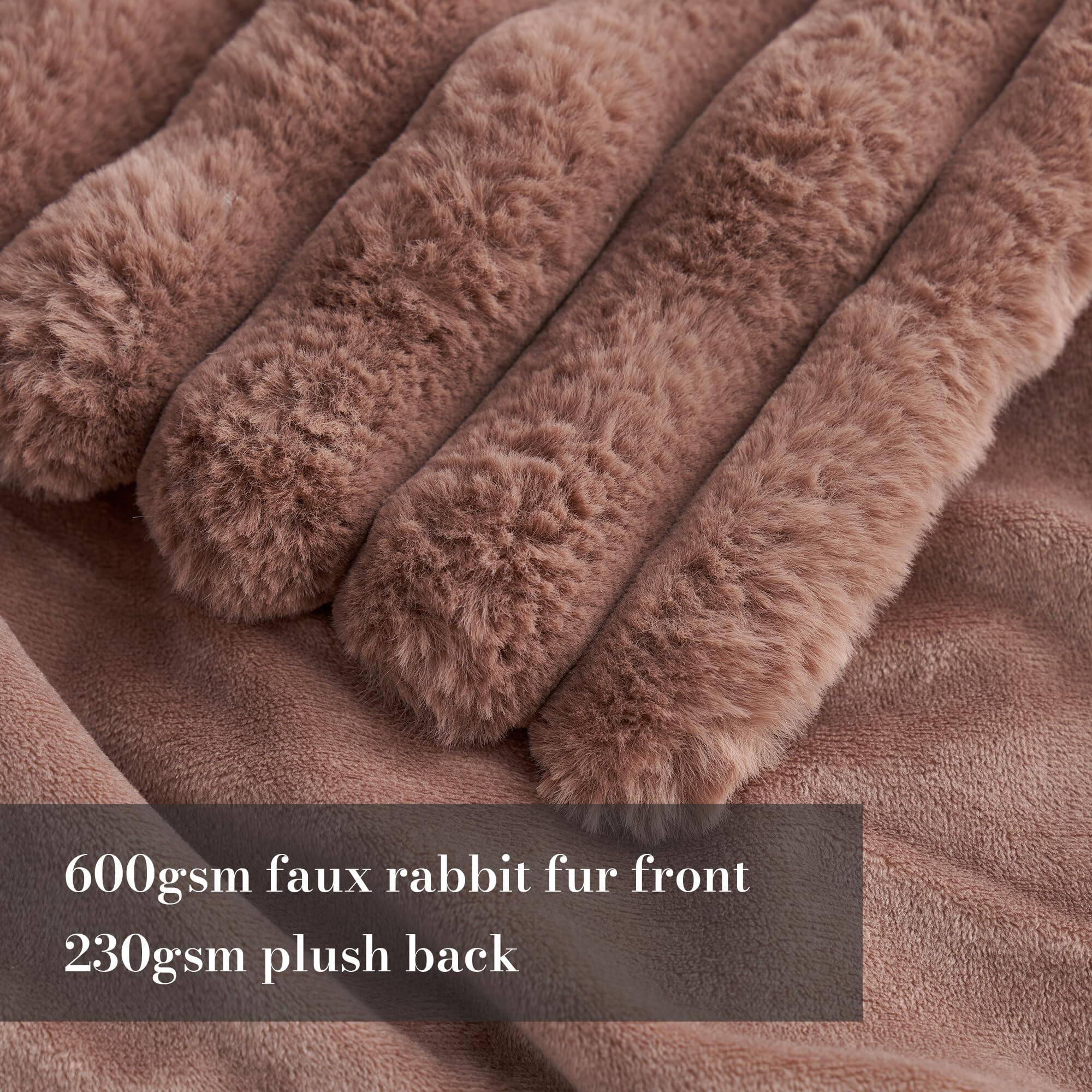 600gsm faux rabbit fur front  
230gsm plush back