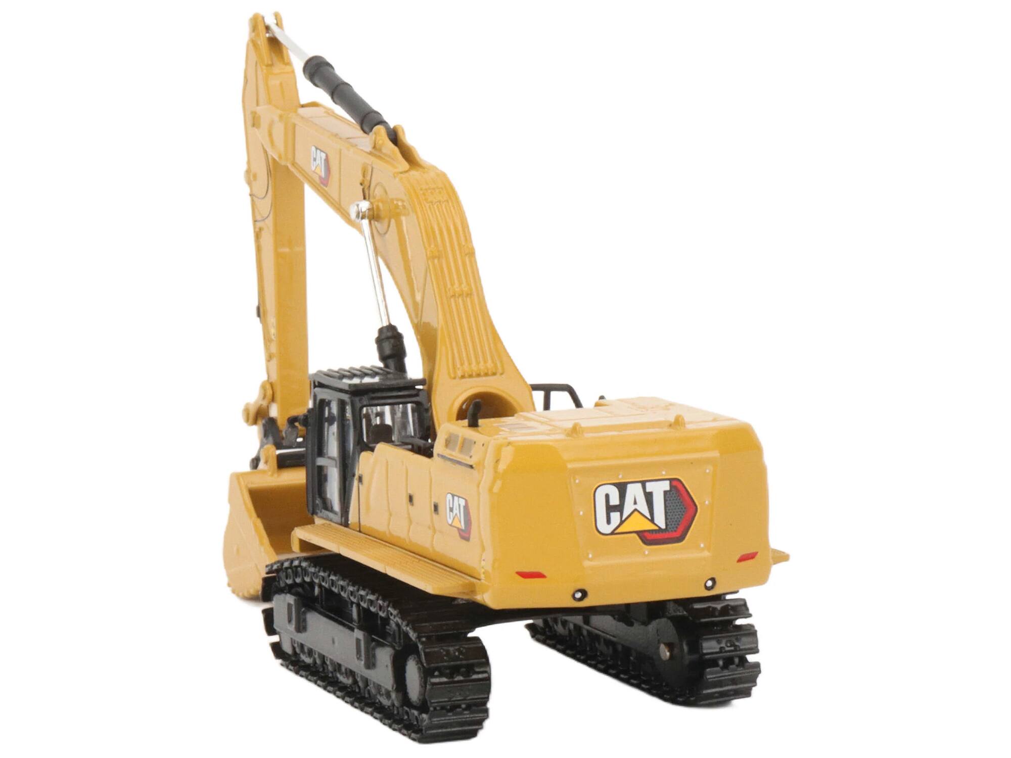 Left. Diecast Masters - CAT 395 Next-Gen Hydraulic Excavator Mass Excavator Yellow with Tools High Line Series 1/87 HO Diecast - Yellow .