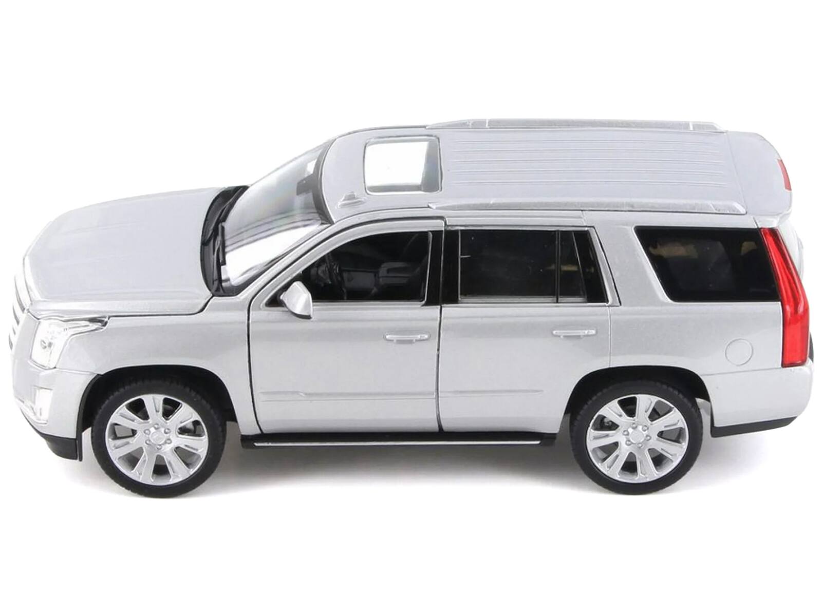 Left. Welly - 2017 Cadillac Escalade with Sunroof Silver Metallic 1/24-1/27 Diecast Model Car by Welly - Silver Metallic.