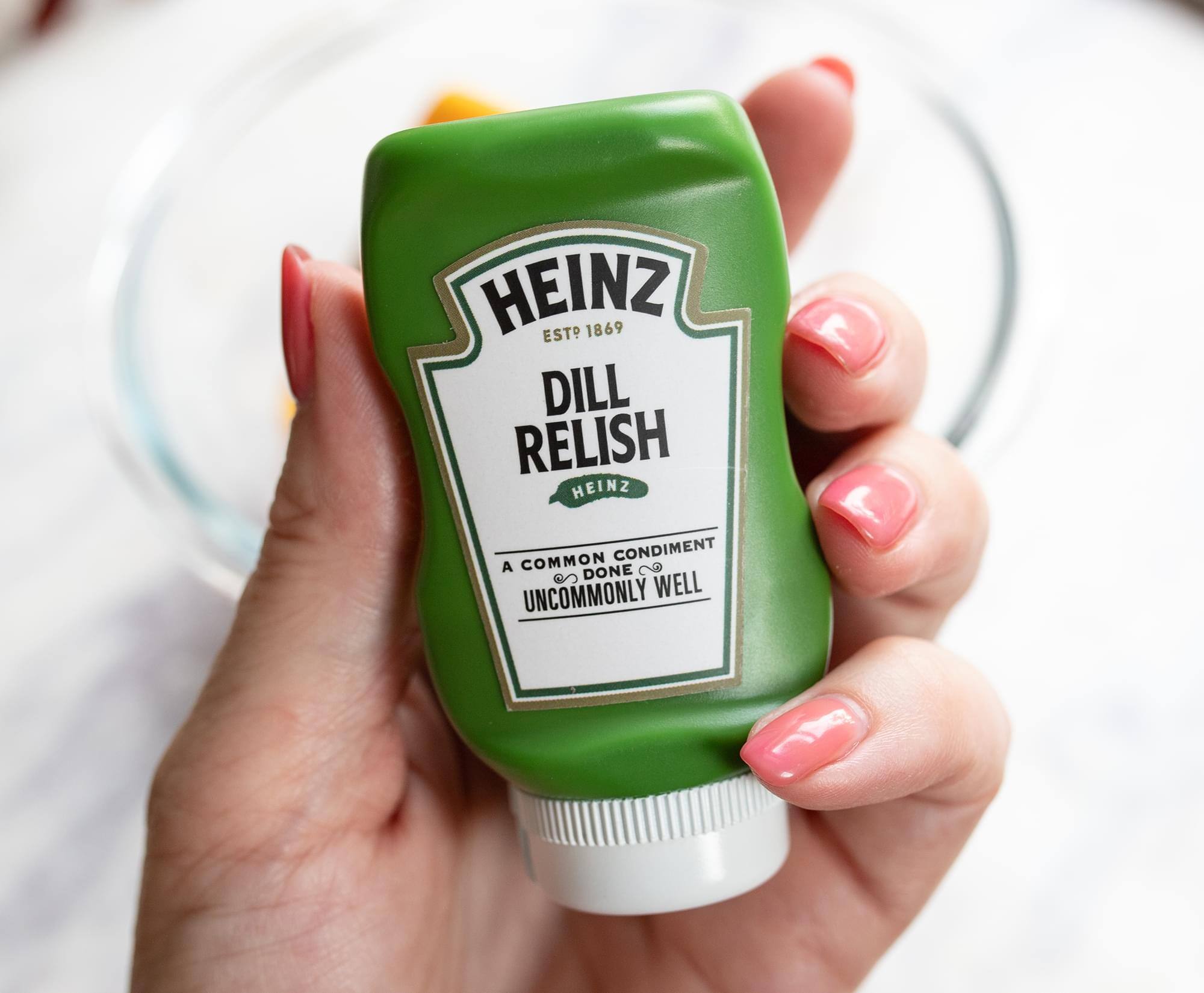 HEINZ EST 1869 DILL RELISH  
HEINZ  
A COMMON CONDIMENT DONE UNCOMMONLY WELL