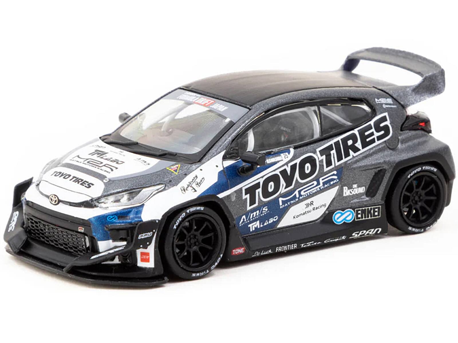 Sure, here is the corrected and grouped text from the image:

- TOYO TIRES
- TOYO TIRES
- M25
- A/m/s
- TMASO
- ENKEI
- SPAN
- TONE
- FRONTIER
- Komatsu Racing
- BISOUND
- RACING
- MATSU RACING
- TMLABO
- Gairik
- 3S
- MP5
- FLABO
- TOYO TIRES
- ElN
- TBOFT
- R
- MRLX
- 25
- TIRES
- TIRS
- nUro
- Raty
- TOYO
- d
- ACING
- MeF
- MATSLN
- MO
- R
- Cts
- Racing
- BISOUND
- CRHO
- ENKEI
- Alm/s
- Komatsu
- NUVO
- TMLABO
- 1
- SPAN
- Gairik
- FRONTIER
- Te
- TONE
- Ae
- Lunt
- MaY
- 2