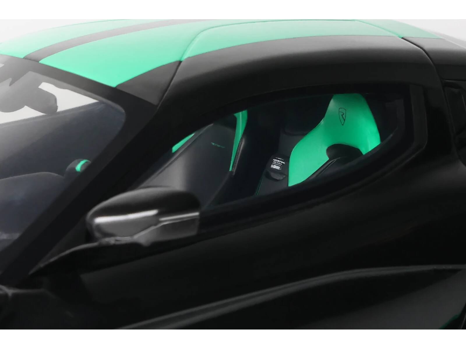 Left. GT Spirit - 2023 Rimac Nevera Black with Green Stripes 1/18 Model Car by GT Spirit - Black with Green.