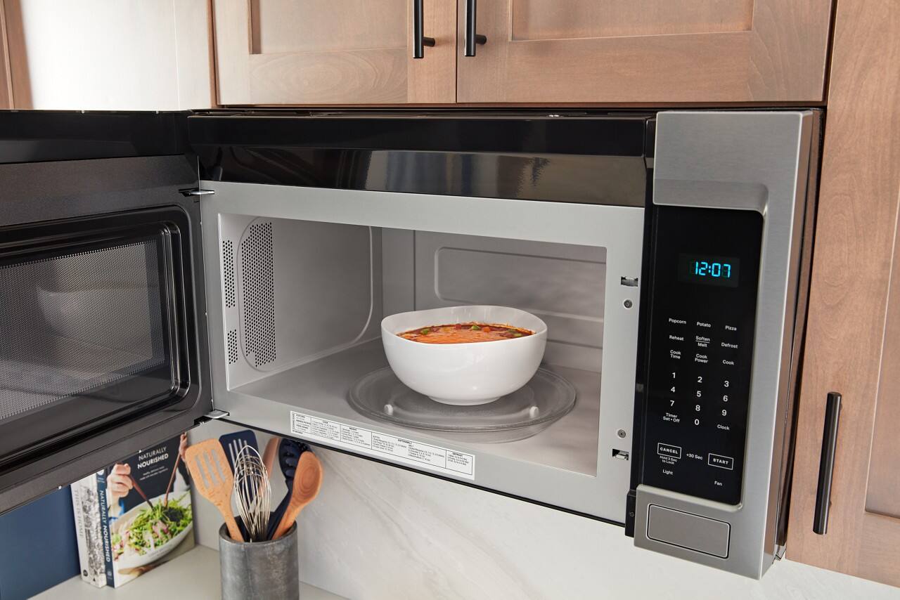 12:07

Popcorn  
Potato  
Pizza  
Reheat  
Cook Time  
Defrost  
Cook  
1 2 3  
4 5 6  
7 8 9  
0  
Start  
Clock  
Cancel  
+30 Sec  
Light  
Fan  
NATURALLY NOURISHED  
NOURISHED NATURALLY