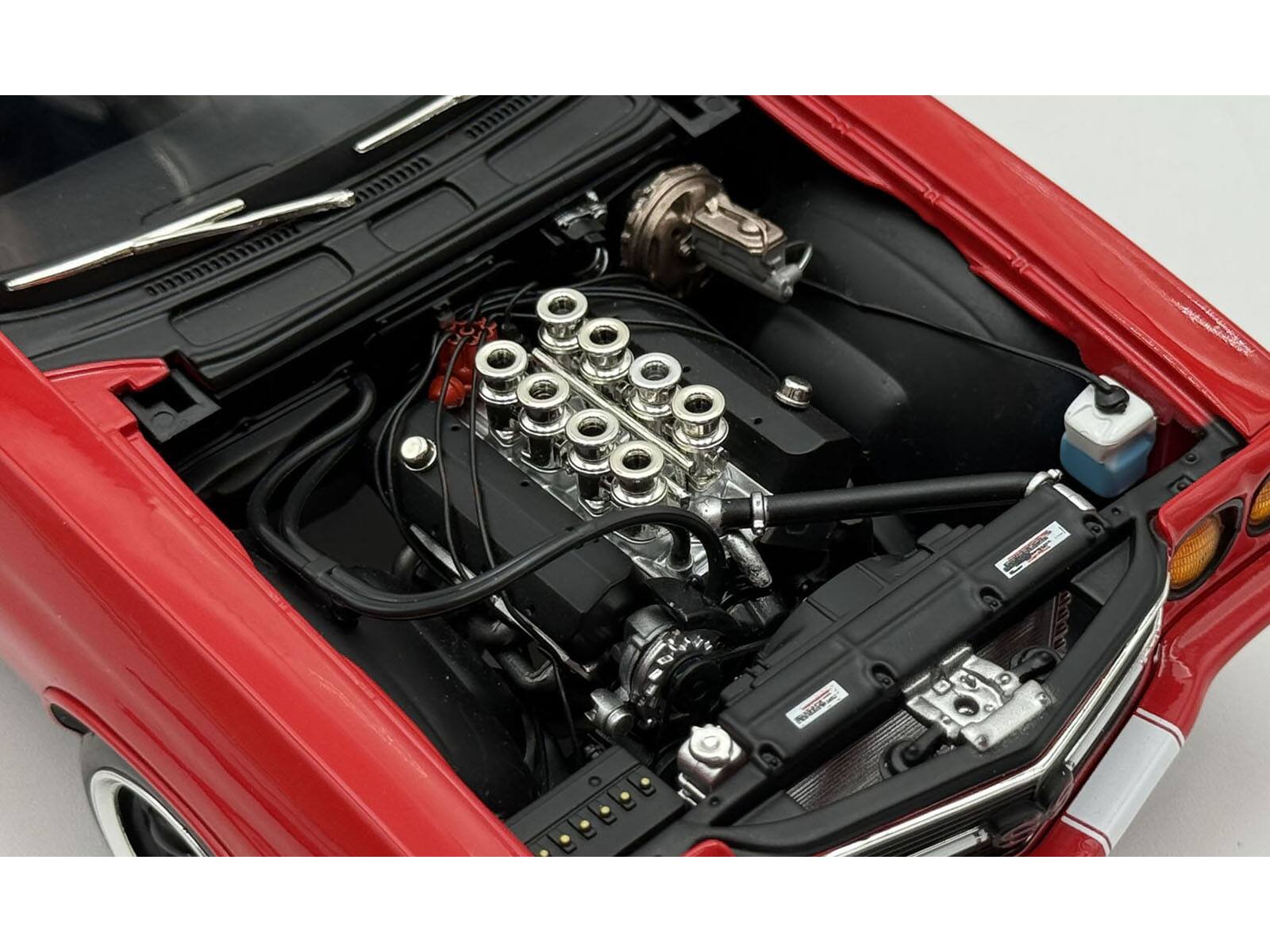 Left. ACME - 1970 Chevrolet Chevelle SS "Red Eye" Red with White Stripes Limited Edition to 354 pieces Worldwide 1/18 - Red with White Stripes.