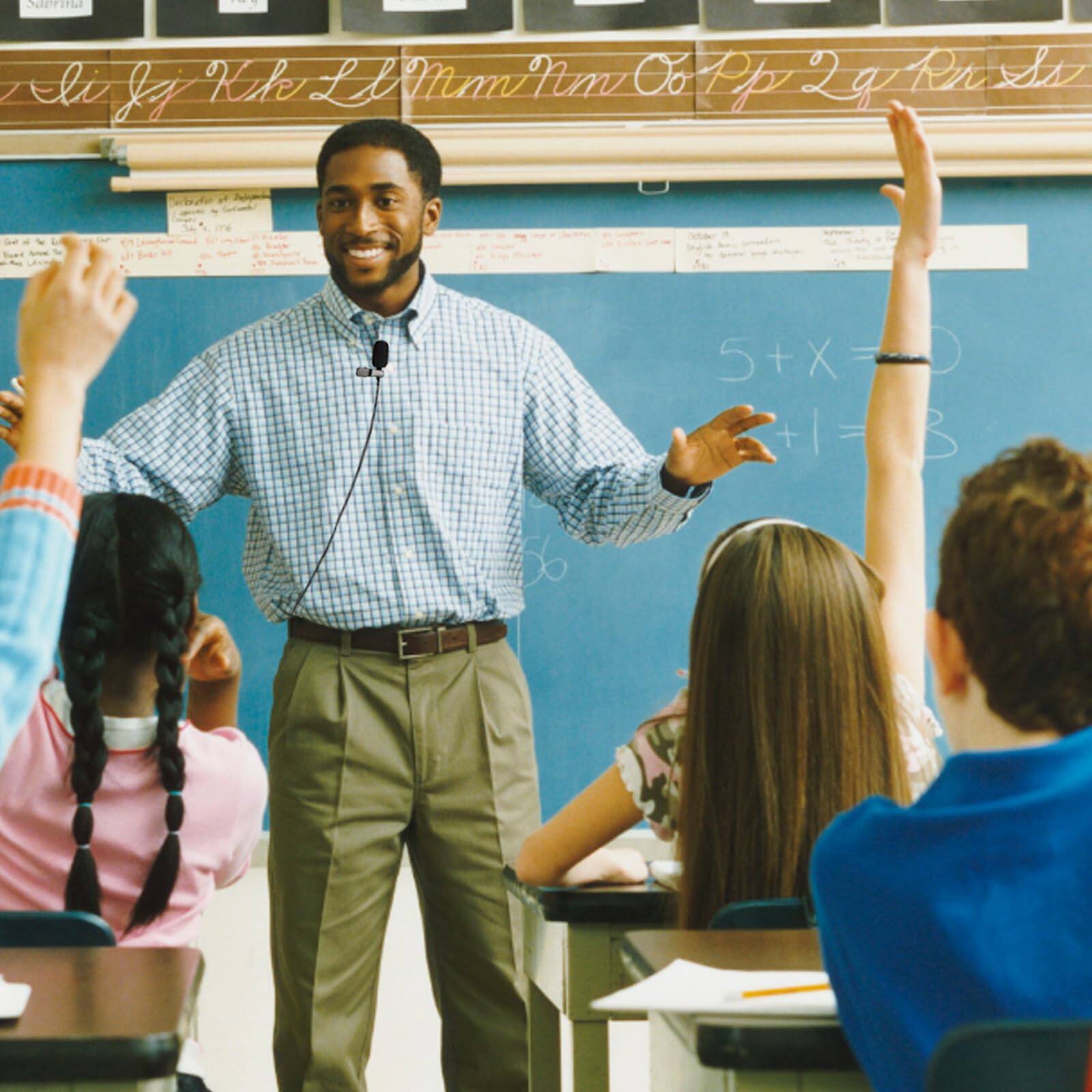 Sure, here is the corrected and grouped text from the image:

**Alphabet Chart:**
- Aa Bb Cc Dd Ee Ff Gg Hh Ii Jj Kk Ll Mm Nn Oo Pp Qq Rr Ss Tt Uu Vv Ww Xx Yy Zz

**Math Problem on the Board:**
- 5 + X = 8
- 5 + 1 = 8