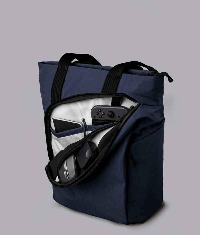 Alt View 2. ALPAKA - Flow Totepack Laptop Backpack for Men, 16" Laptop Compartment + 11" Tablet Sleeve, Tote/Backpack, Bottle Pocket - Moonlight Blue Axoflux 400D Washed Nylon.