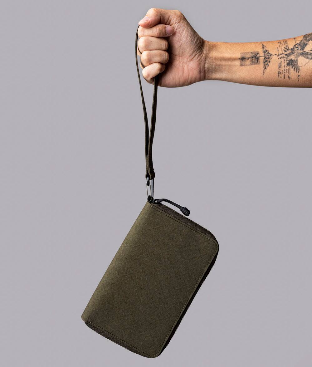 Alt View 9. ALPAKA - RFID Zip Passport Wallet with Boarding Pass Pocket, 7 Card Slots, Magnetic Flaps, Detachable Hand Strap - Army Green Axogrid 300D.