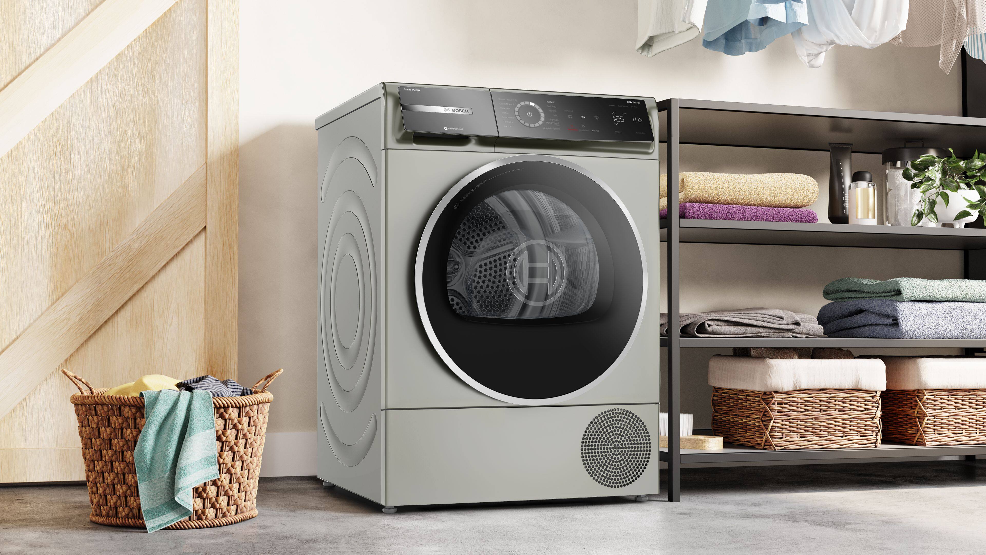 Bosch is the brand of the washing machine and dryer in the image.