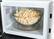 Alt View 2. Nostalgia - Retro 0.7 cu. ft. 700-Watt Countertop Microwave - White.