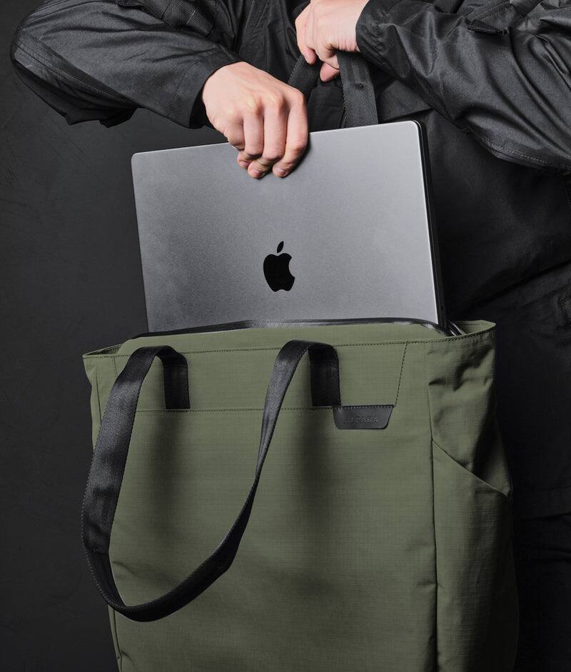 Alt View 2. ALPAKA - Metro Tote Laptop Tote Bag for Work, Work Tote Fits 16" MacBook Pro, Side Bottle Pocket, Weather-Resistant, Key Tether - Green Axoflux 210D.