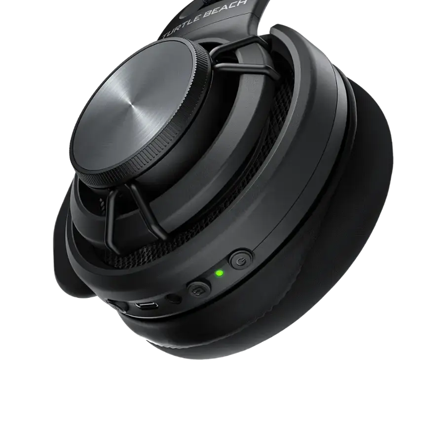 The image shows a close-up of a black headset, which is designed by the company Beach Turtle. The headset has a black and silver color scheme, and it appears to be a high-quality device. The headset is likely used for listening to music or making phone calls, and it is designed to provide a comfortable and secure fit for the user.