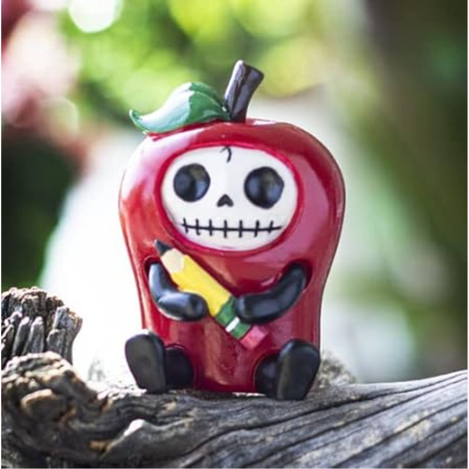 Angle. Pacific Trading - Furrybones Ringo Signature Skeleton in a Red Apple Costume with a Pencil Friend Figurine - Red.