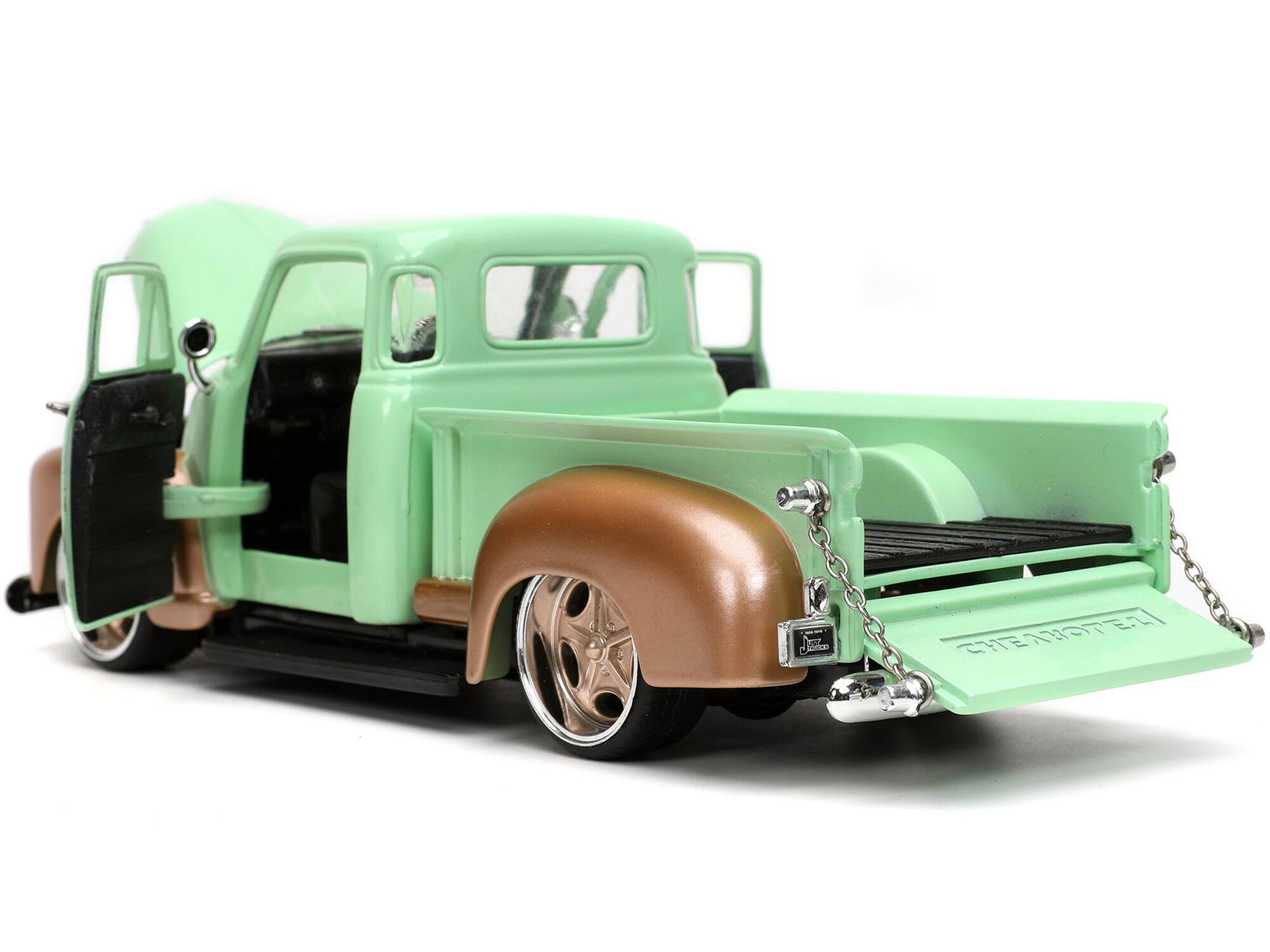 Back. Jada - 1953 Chevrolet 3100 Pickup Truck 1/24 Diecast Light Green Gold "Rusty's Garage" with Extra Wheels "Just Trucks" Series - Light Green And Gold Metallic.