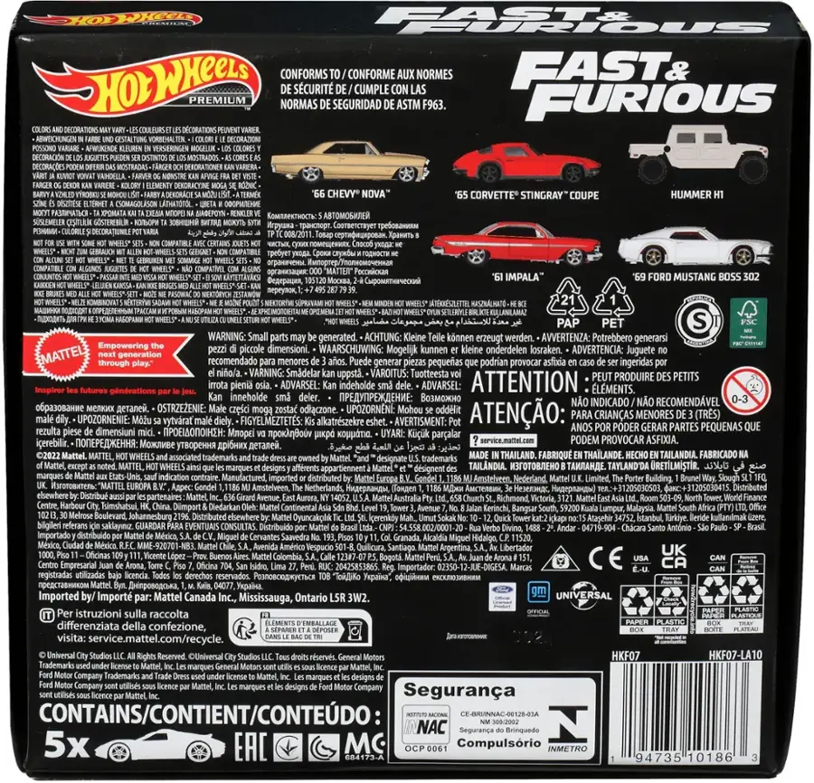 The text on the image is in Spanish, but it appears to be a warning or instructions for a toy or product. It mentions the toy being made in Thailand and warns against potential choking hazards or small parts that could pose a risk to children. The text also includes a barcode and a sticker with the word "SEGURIDAD" on it, which translates to "safety" in English.