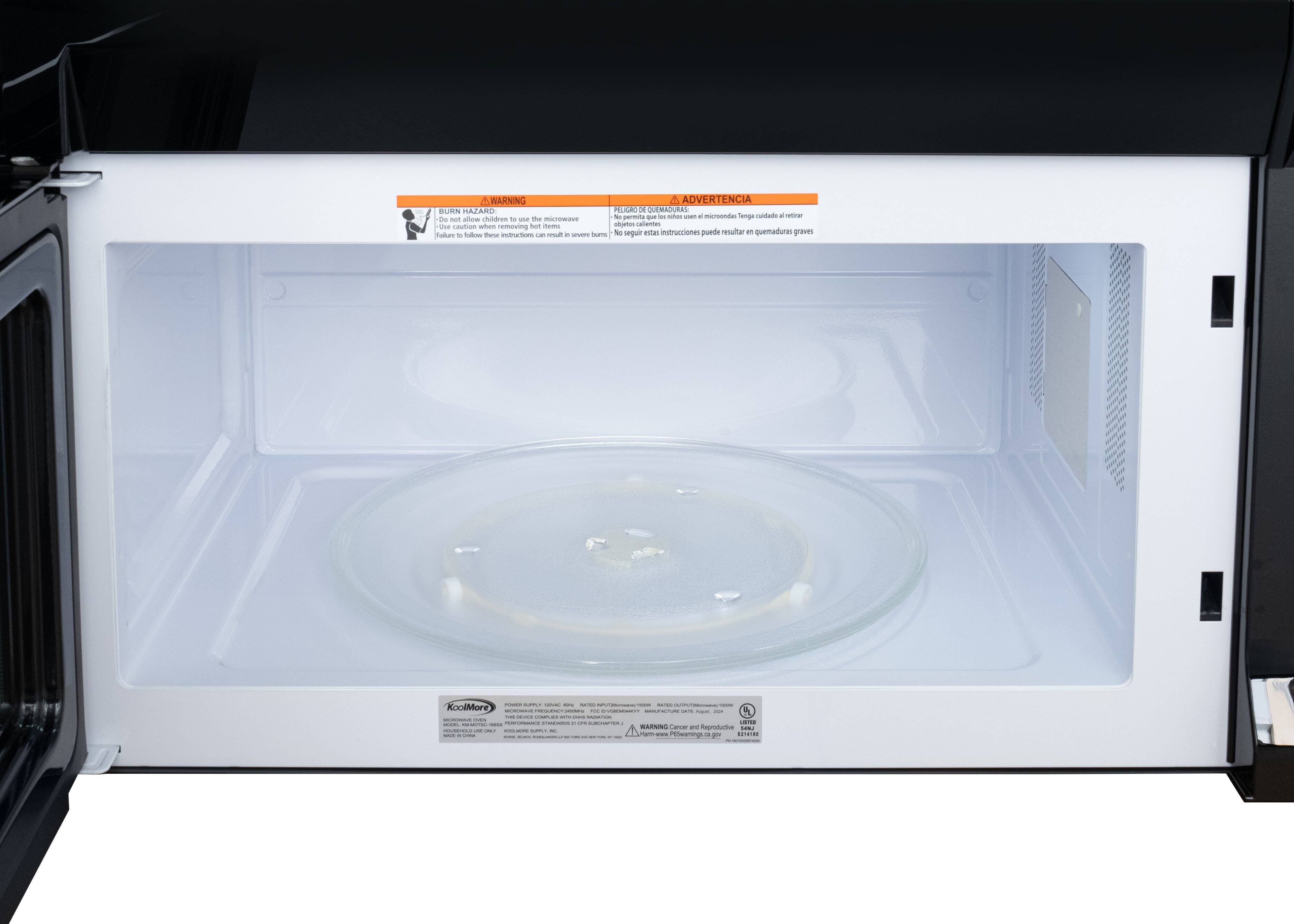 A WARNING ADVERTENCIA BURN HAZARD PELCAC 3 DUEMADURAS S prmmita un - - - - miereenaes Senge curdado a natzar de I aow children o - te morowave the caution when fu em -io calaine mrving Talure S tune imatis w - - STs N egui stas instrucciones puede resultar - quemaduras gares to - - -..  KoolMore -- C | - - - - - - - : : : :  i - - - I - . | : : RARSING Caoer - naprtunts i | : - I I : | - eamig
