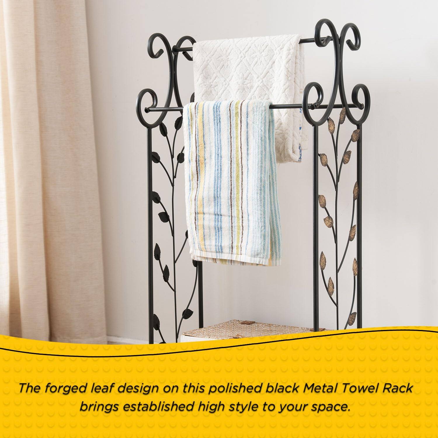 The forged leaf design on this polished black Metal Towel Rack brings established high style to your space.